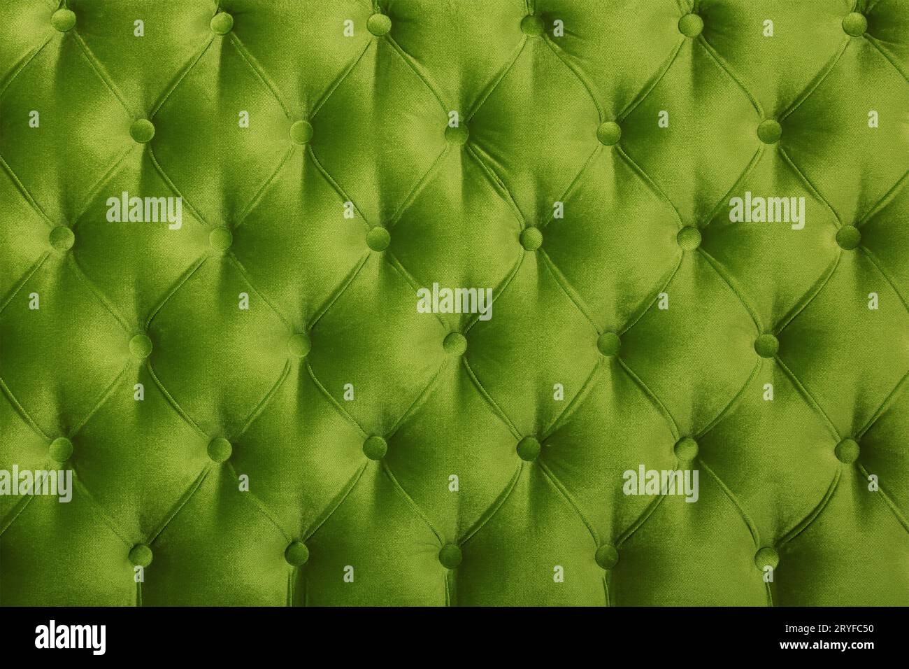 Green capitone tufted fabric upholstery texture Stock Photo
