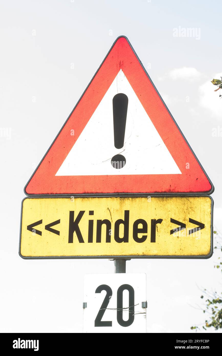 Attention children traffic sign on the way to school Stock Photo - Alamy