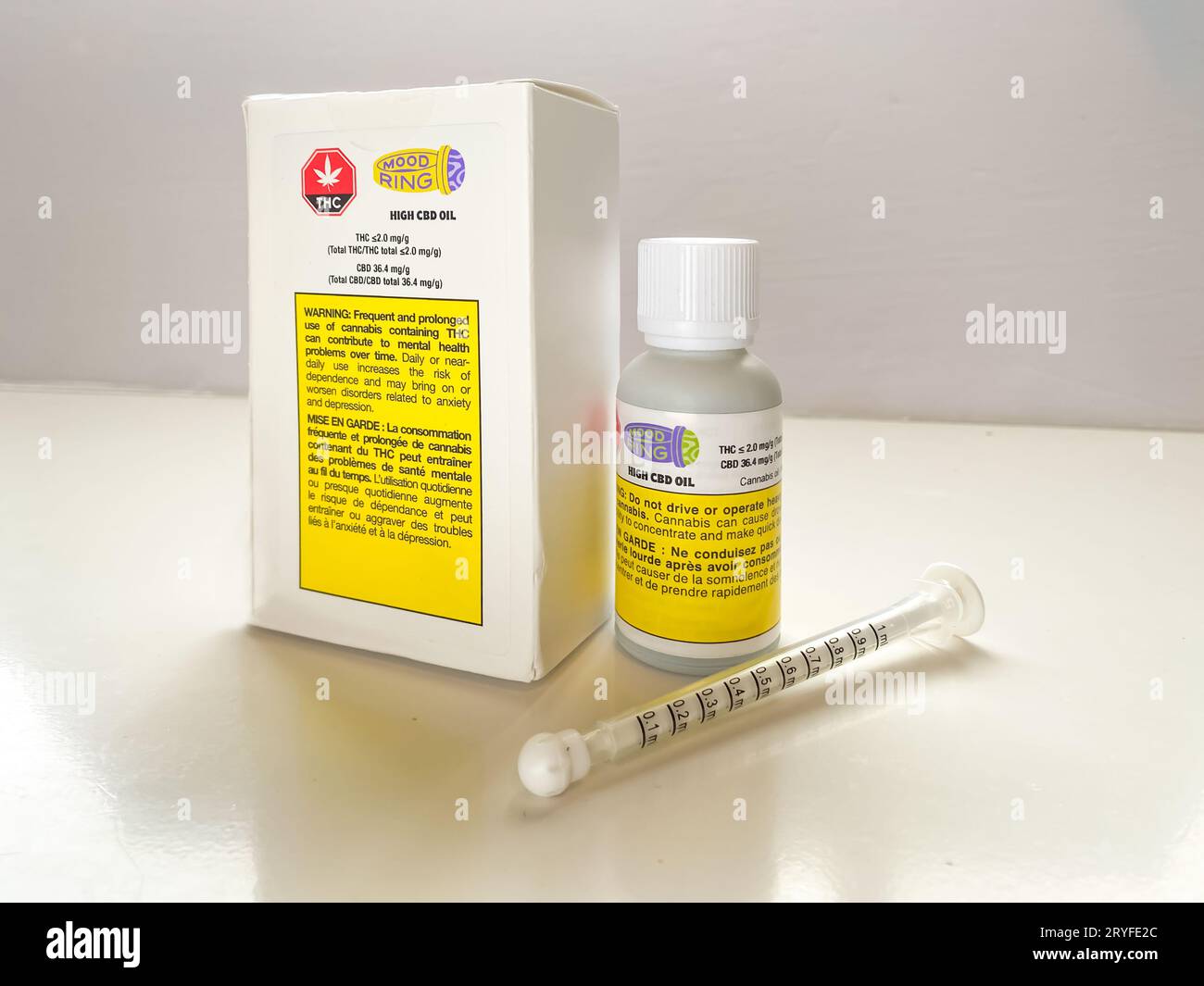 Calgary, Alberta, Canada. Jan 24, 2022. A bottle of Mood Ring a high CBD cannabis oil with a syringe applicator Stock Photo