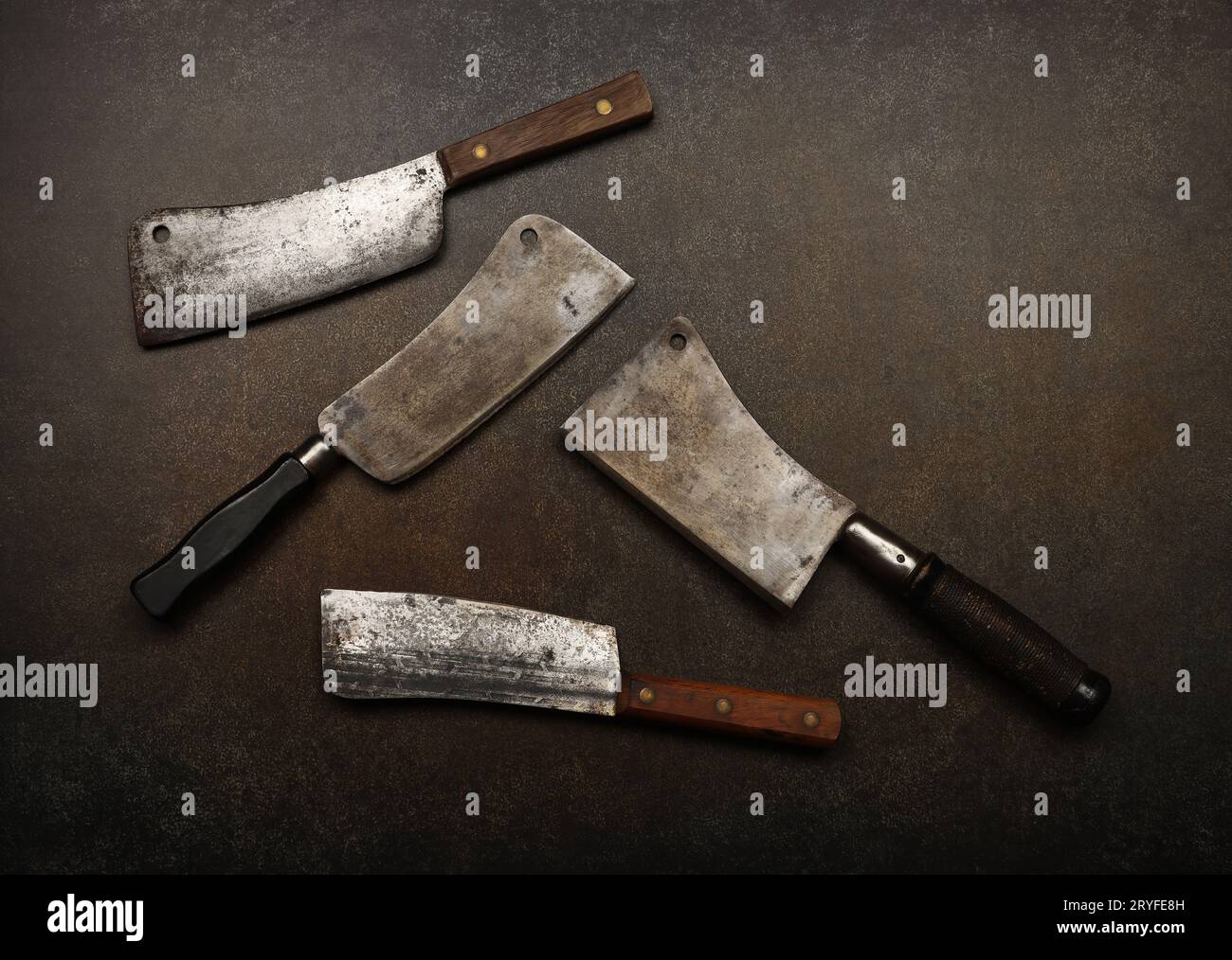 Vintage butcher meat cleavers on table Stock Photo Alamy