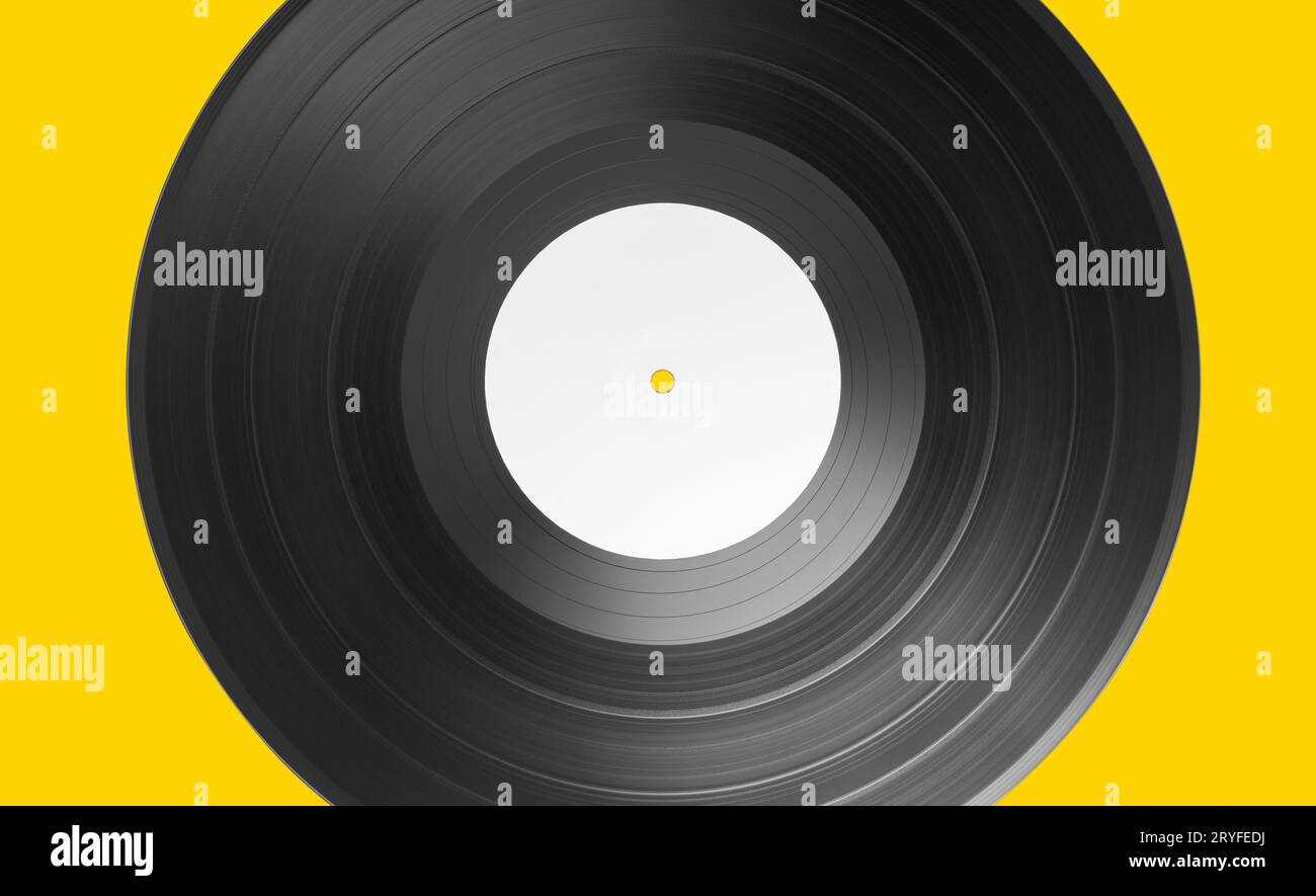 Vinyl record on yellow background. White label Mock up Stock Photo - Alamy