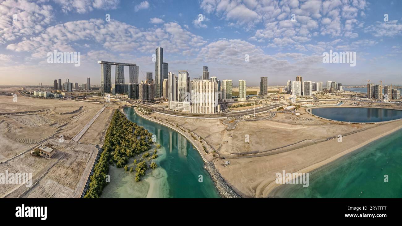 Aerial view on developing part of Al Reem island in Abu Dhabi on a cloudy day Stock Photo