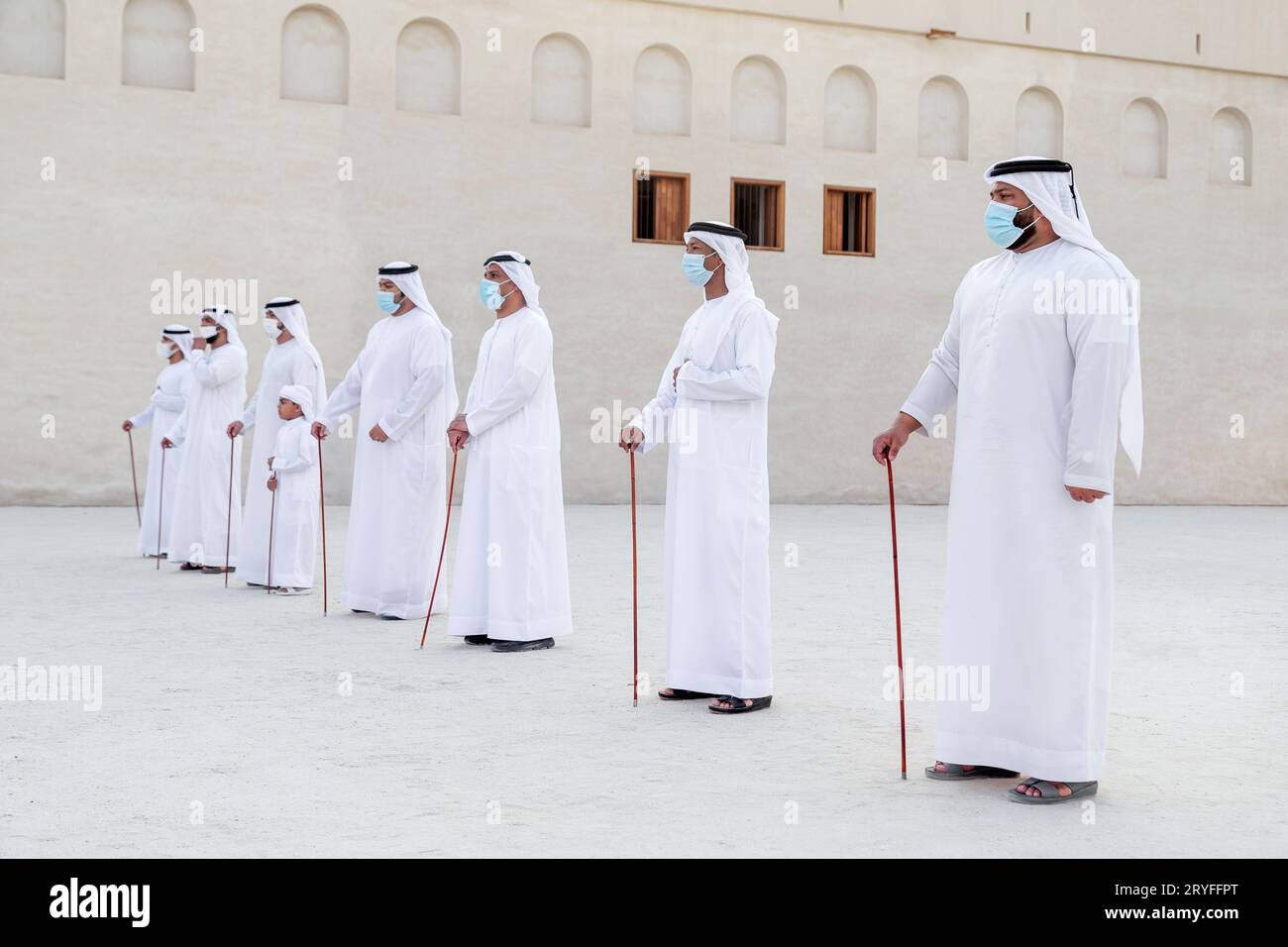 ABU DHABI, UAE - MAY 14, 2021: Traditional Emirati male Al Ayalah dance at Al Hosn Festival Stock Photo