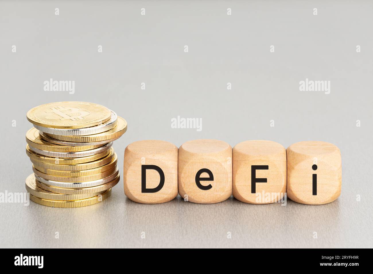 DEFI Cryptocurrency concept. Stacked crypto coins and wooden blocks with  text. Copy space Stock Photo - Alamy