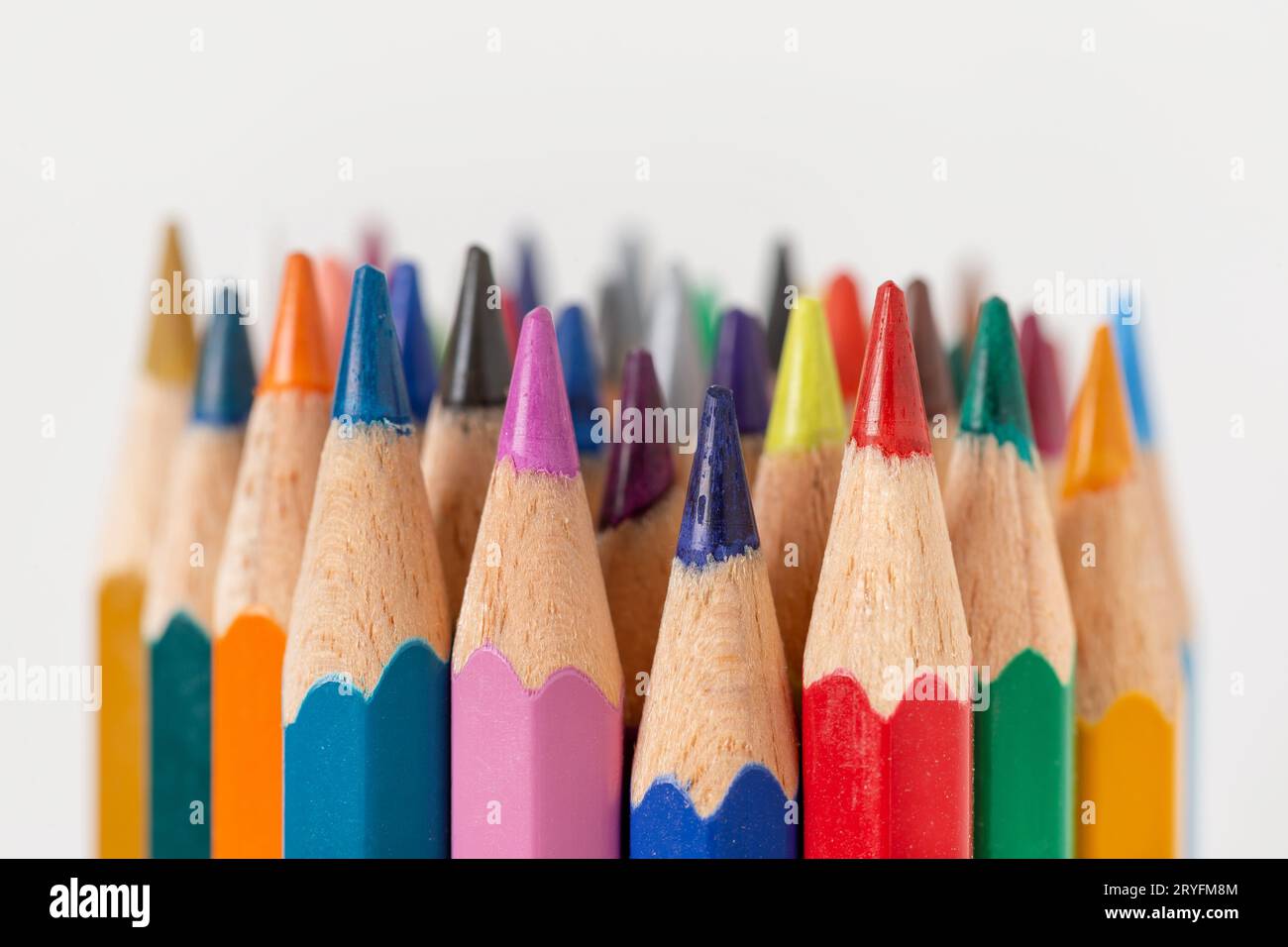Closeup of sharpened coloring pencils isolated on white background, arts and crafts, back to school concept Stock Photo