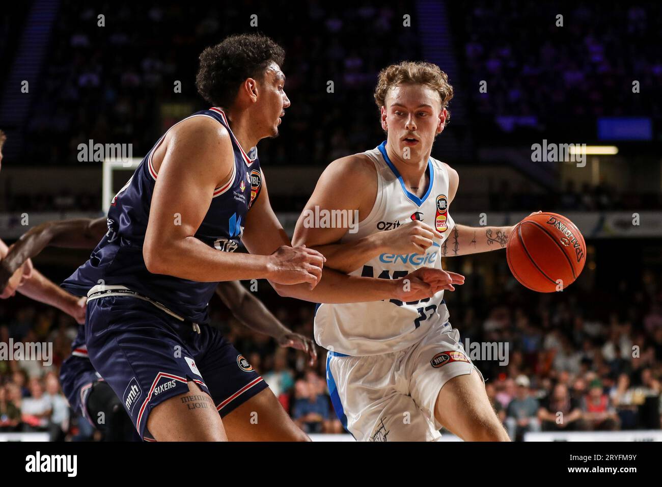 Adelaide, Australia. 01st Oct, 2023. Luke Travers of Melbourne United  challenged by Kyrin Galloway of the 36ers during the round 1 NBL match  between the Adelaide 36ers and Melbourne United at Adelaide