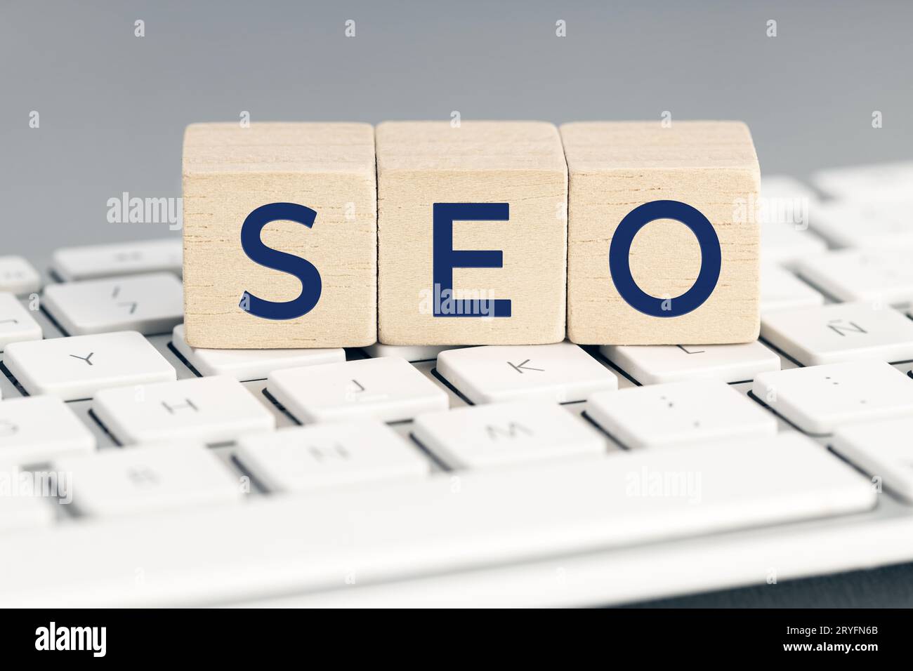 SEO word on wooden blocks on computer keyboard. Search Engine optimization concept Stock Photo