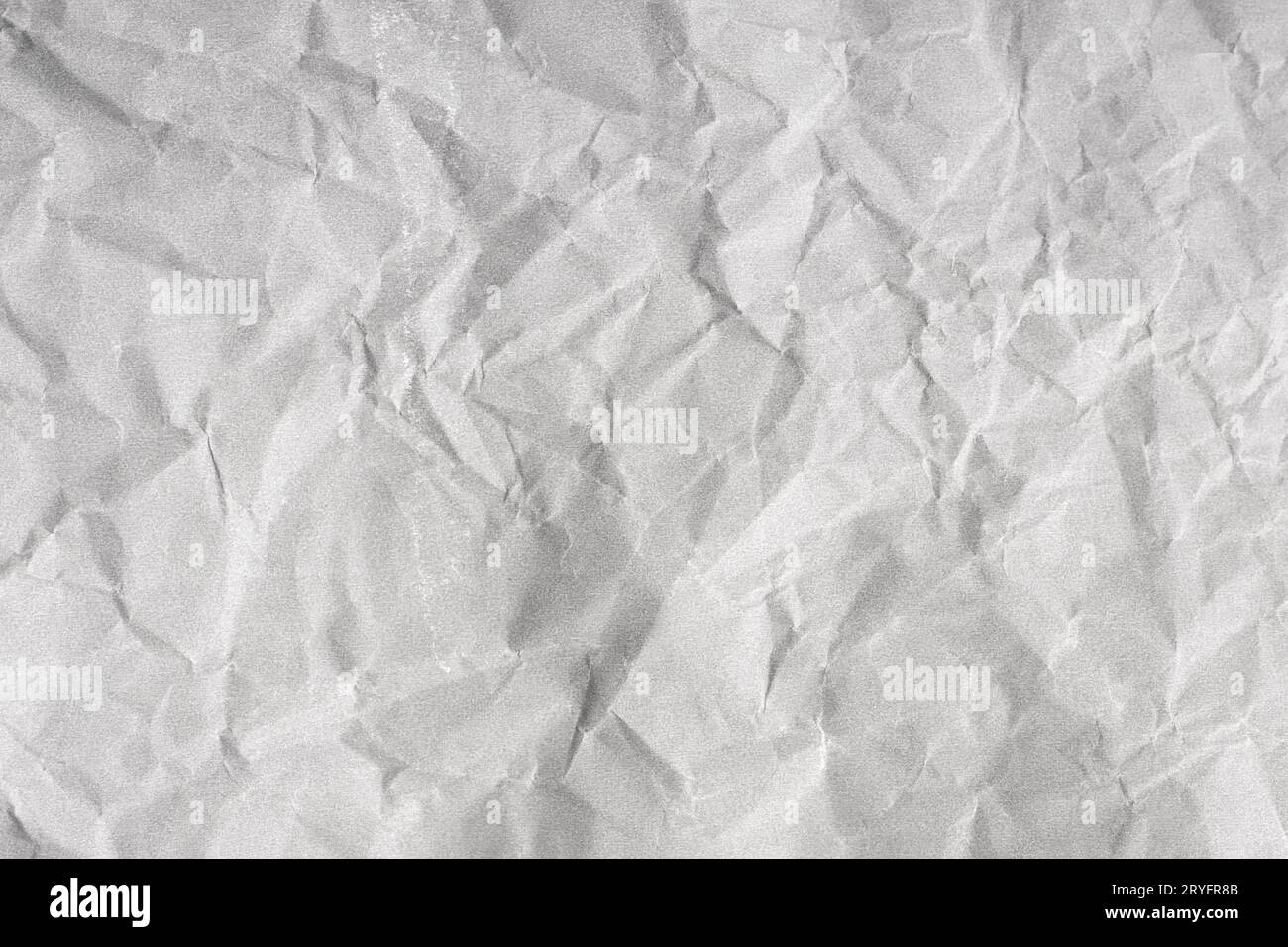 Creased paper background texture. Gray color. Full frame Stock Photo