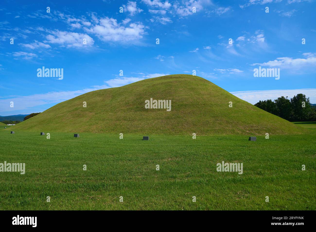 Blue sky and burial mounds in Gyeongju, South Korea Stock Photo