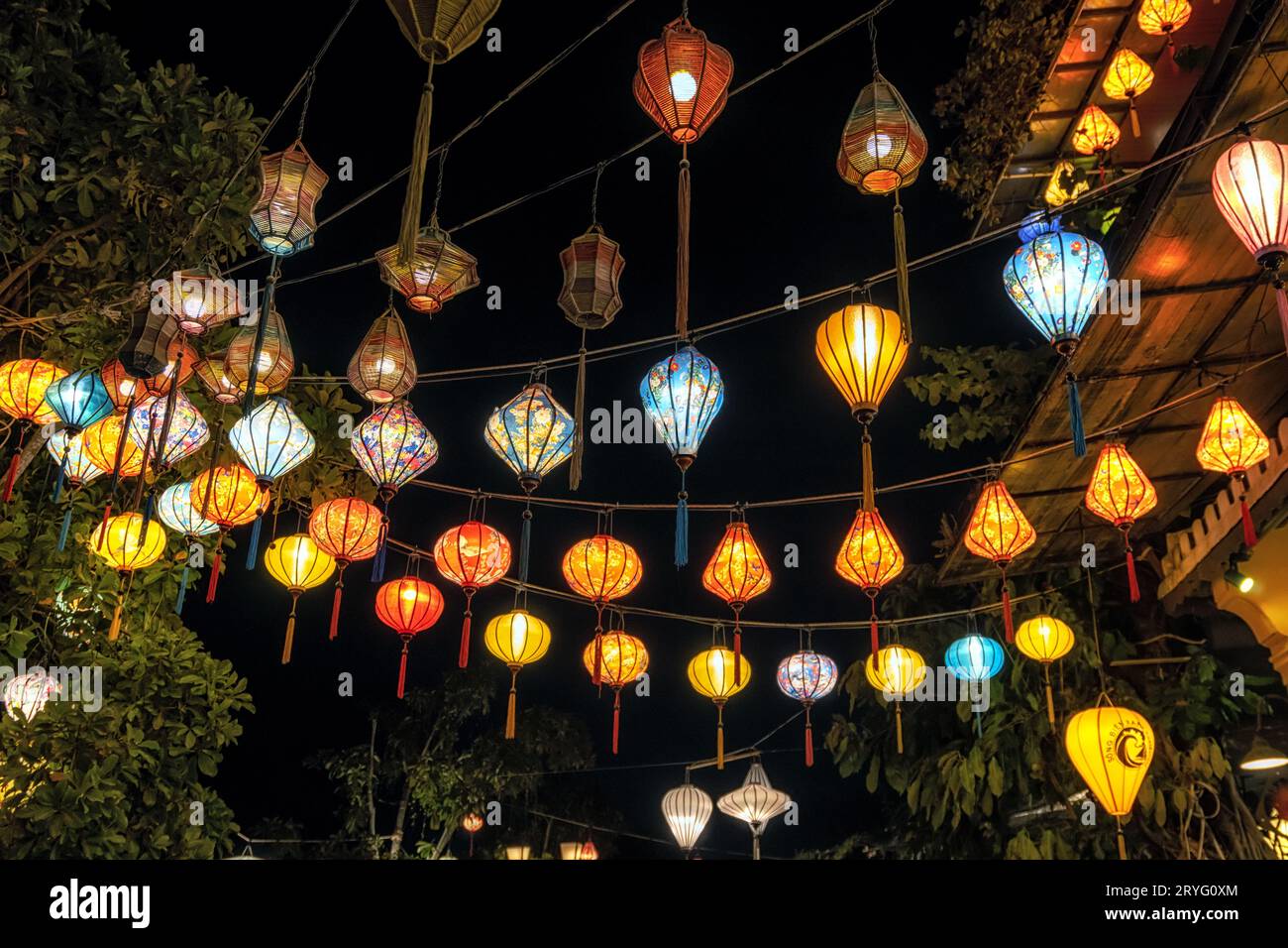 Lit colorful lanterns hanging hi-res stock photography and images - Alamy