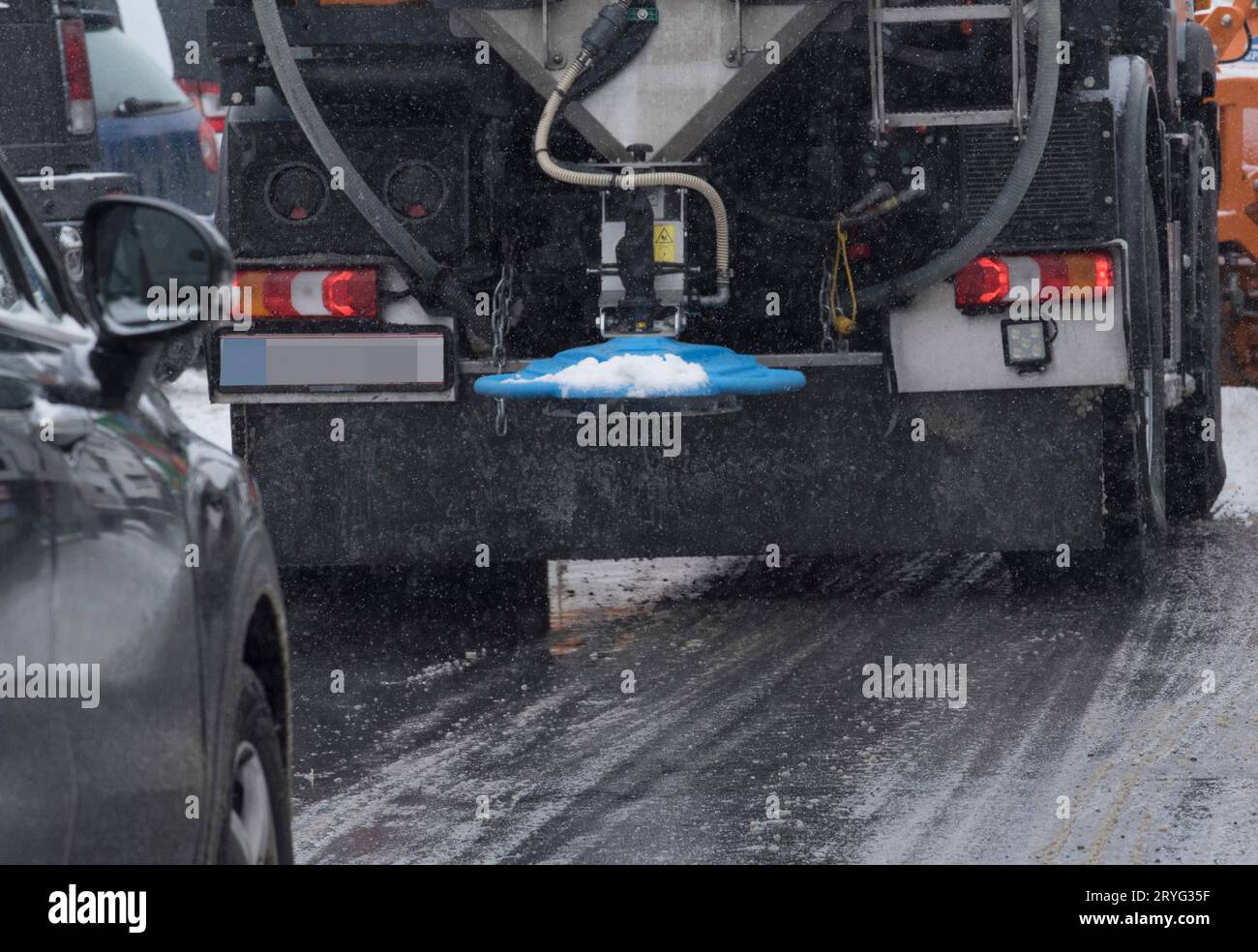 Salt spreading on a road in winter Stock Photo Alamy