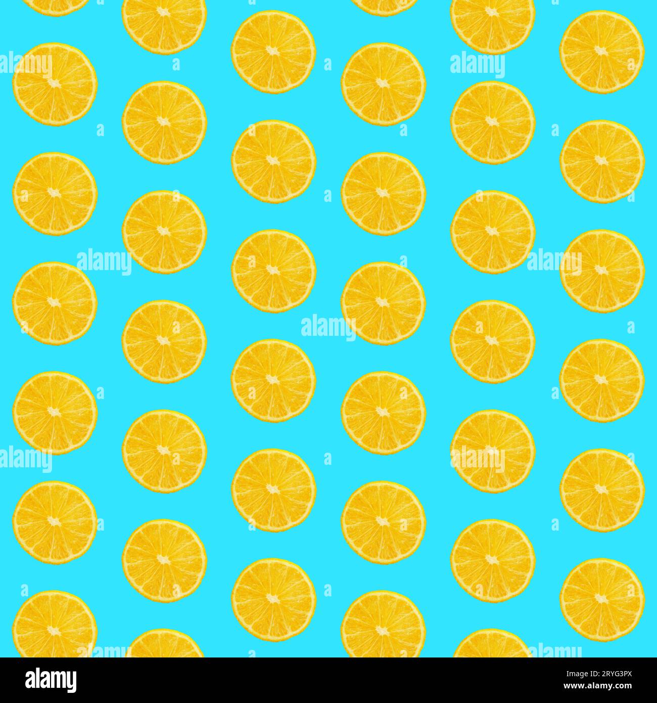 Seamless pattern of oranges on blue background Stock Photo