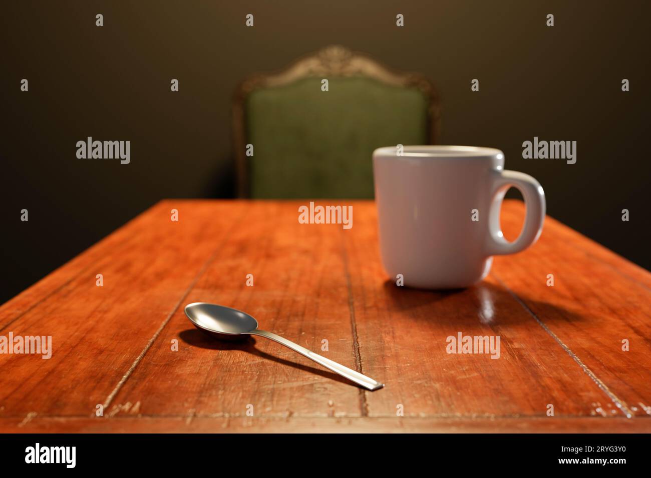 White porcelain tea cup on a wooden kitchen table. Stock Photo