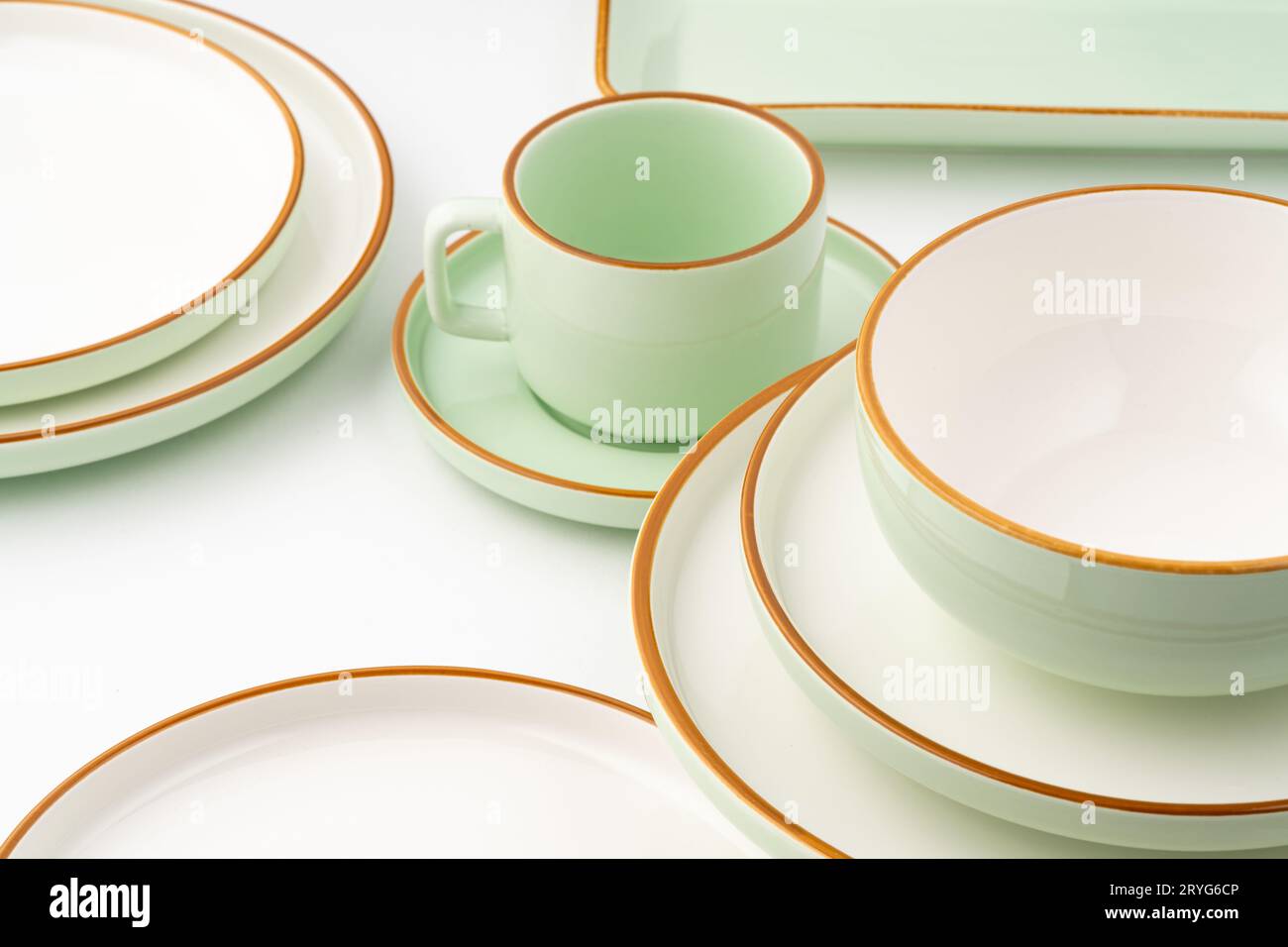 A set of ceramic tableware isolated on white background Stock Photo