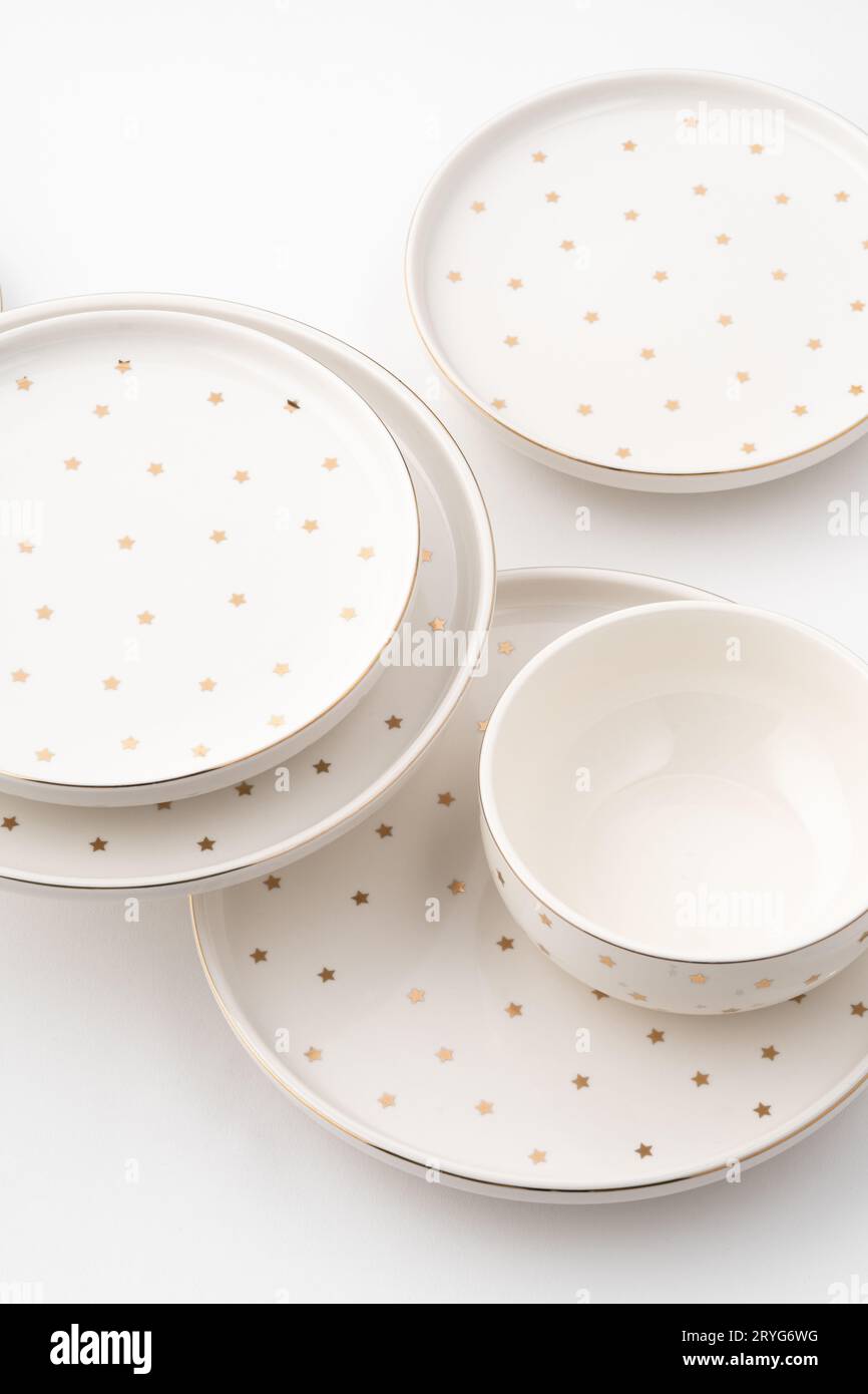 A set of ceramic tableware isolated on white background Stock Photo