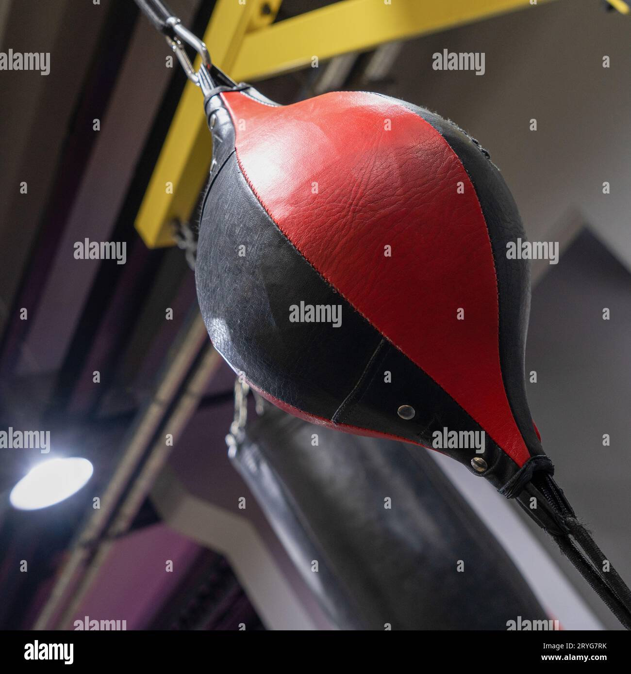 A vertical closeup of a boxing punching bag in the sports complex Stock ...