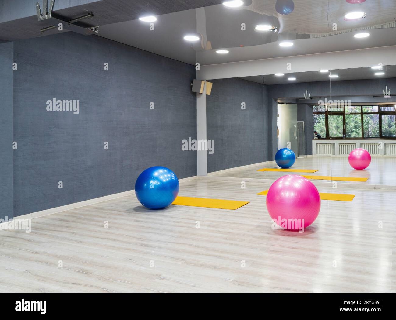 The exercise balls in the sports complex Stock Photo