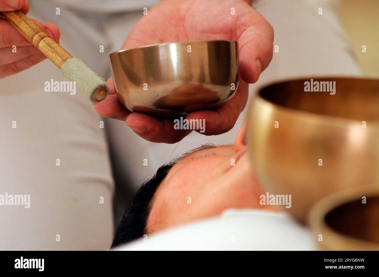 Singing bowl at massage therapy Stock Photo Alamy