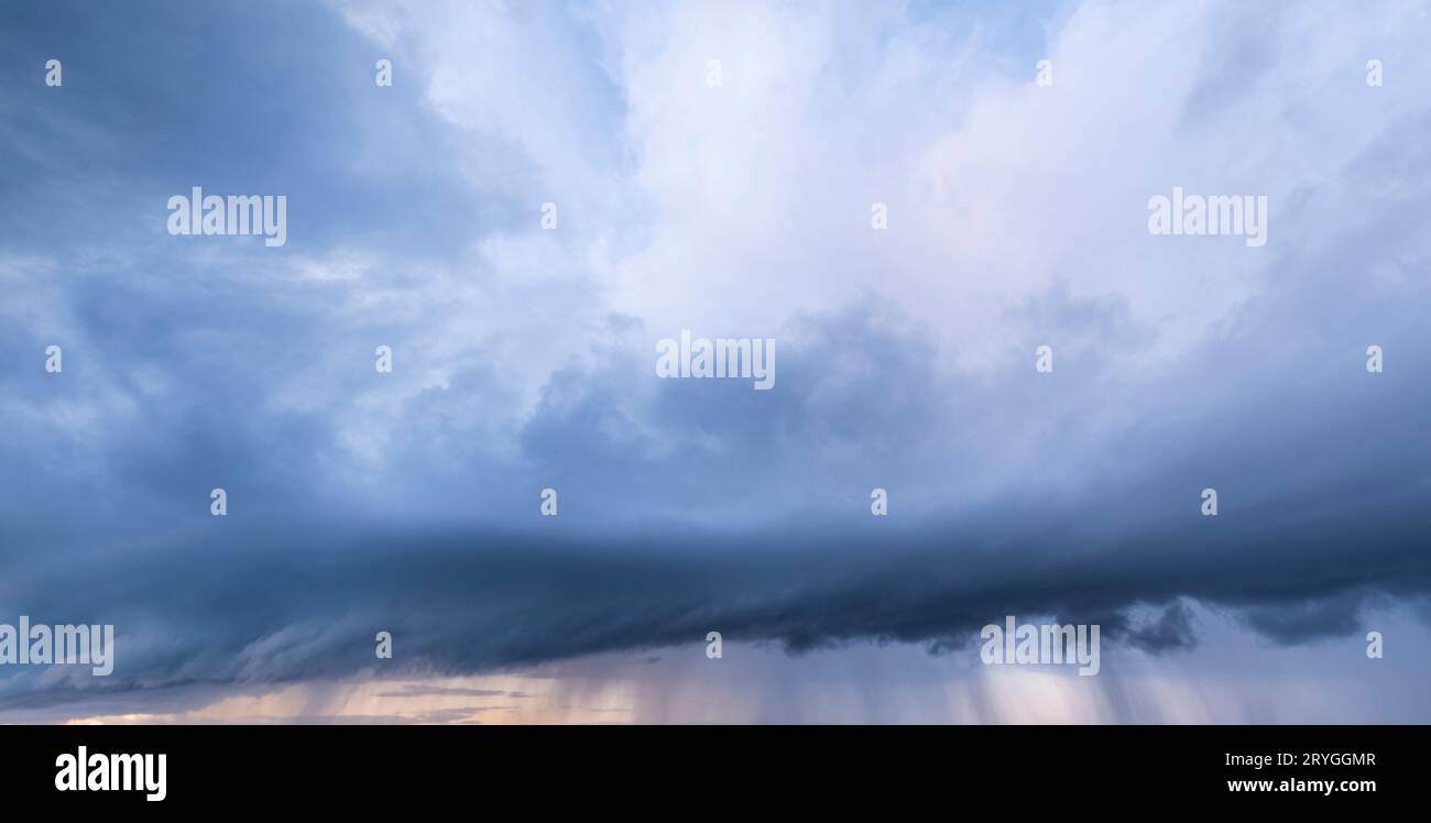 Cloudy sky with gloomy rain clouds Stock Photo