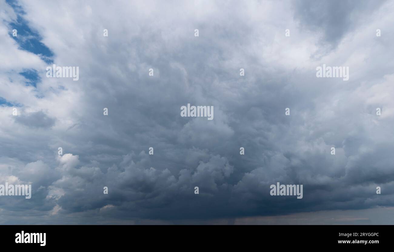 Cloudy sky with gloomy rain clouds Stock Photo