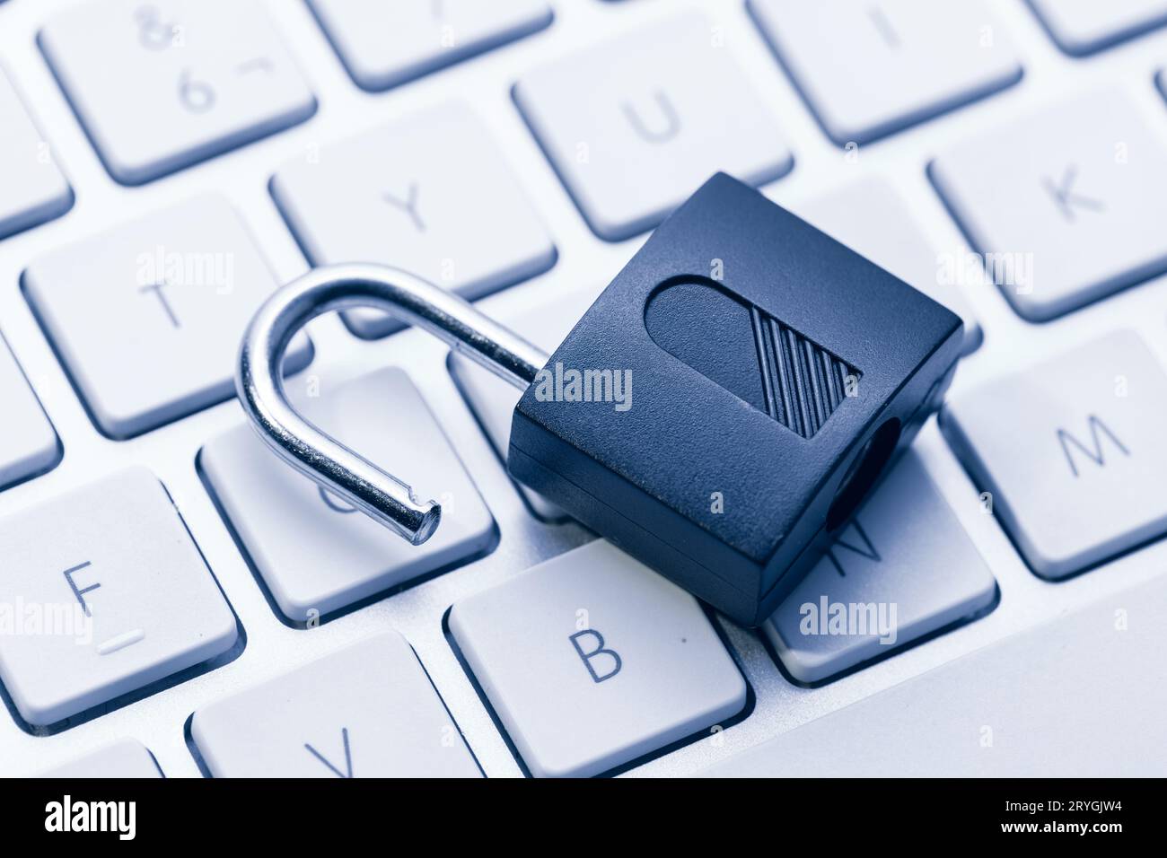 Computer and network Security Vulnerability concept. Open padlock on keyboard Stock Photo