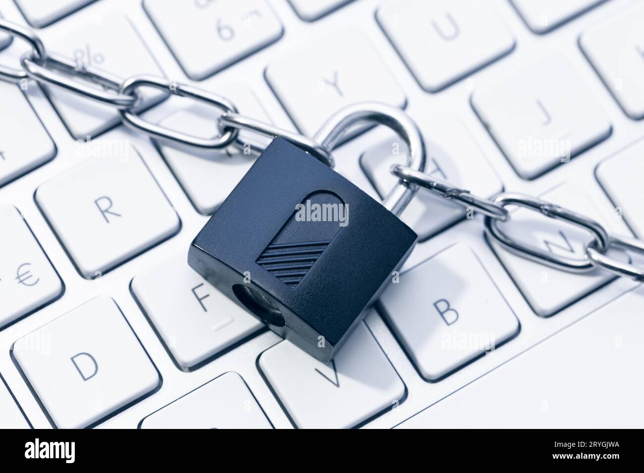 Computer Security and data privacy concept. Chain and padlock on keyboard Stock Photo