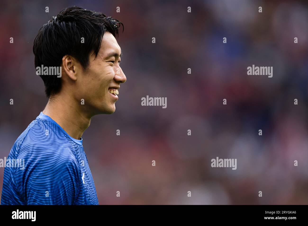 Daichi Kamada of SS Lazio smiles during warm up prior to the Serie A football match between AC Milan and SS Lazio. Stock Photo