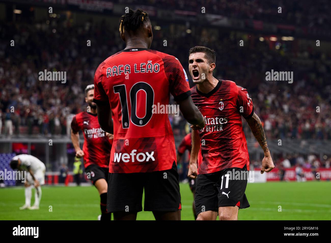 Christian Pulisic of AC Milan celebrates with Rafael Leao of AC Milan ...