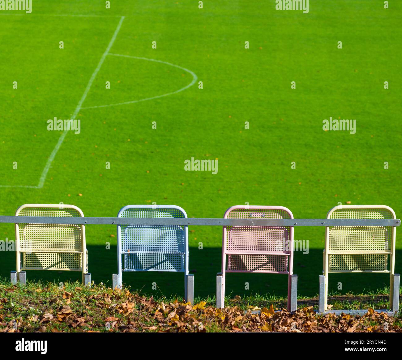Bench on the Sideline of a Football Field Stock Photo