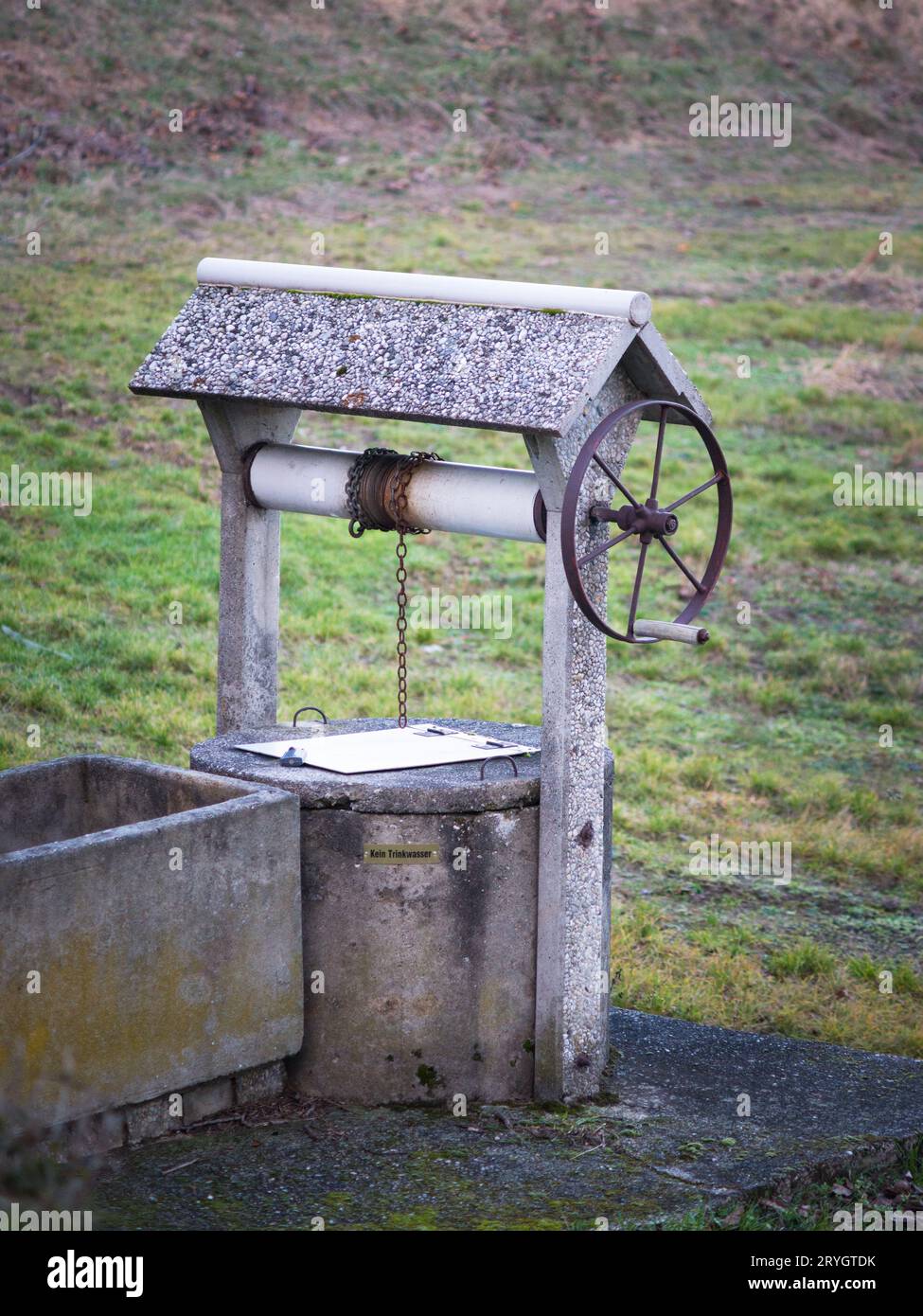 Brick water well wooden roof hi-res stock photography and images - Alamy