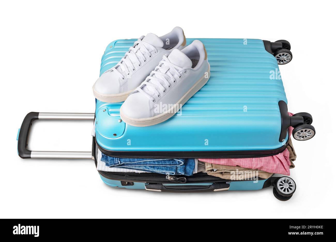 Open suitcase with casual clothes Stock Photo