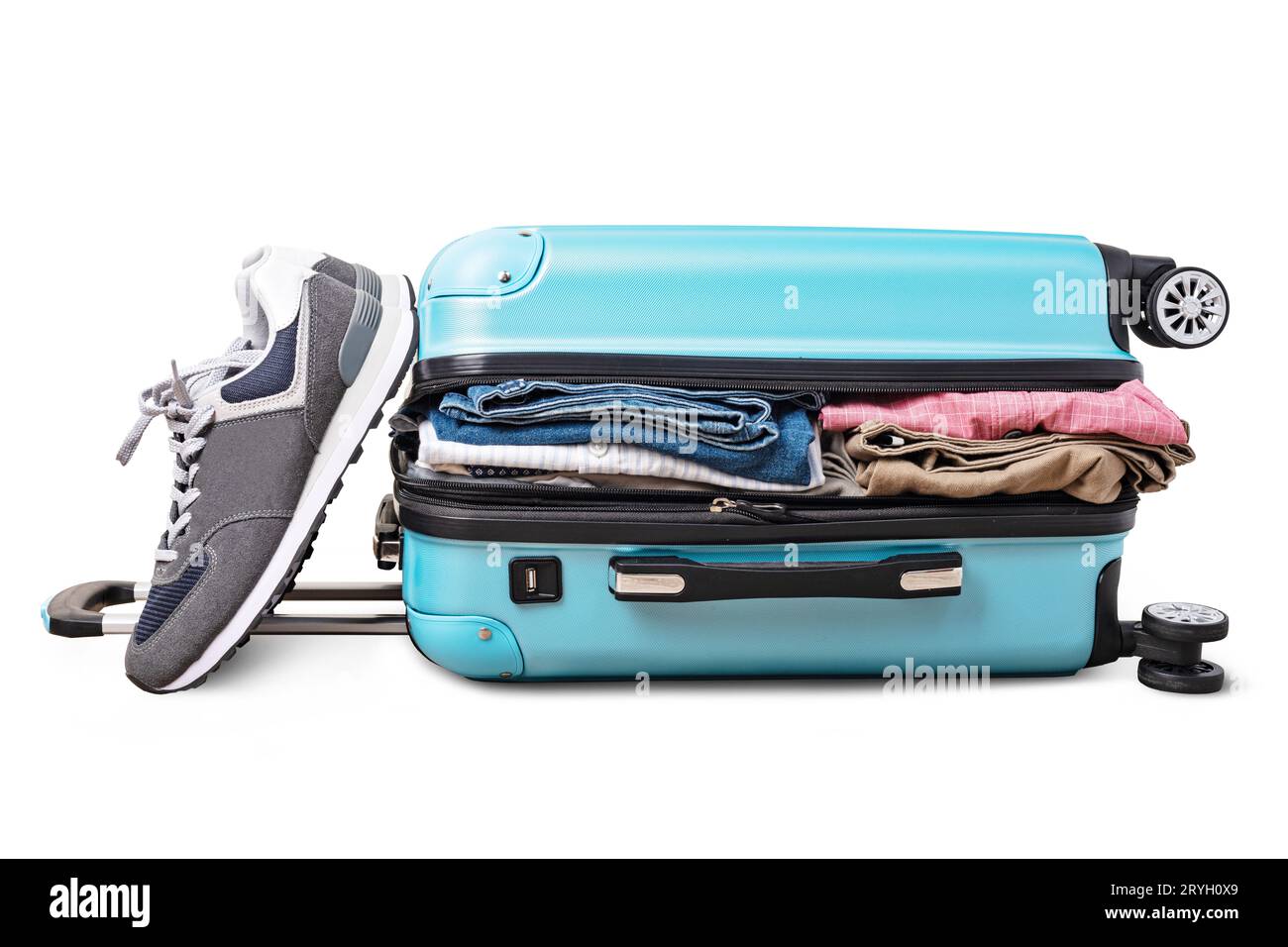 Open suitcase with casual clothes Stock Photo