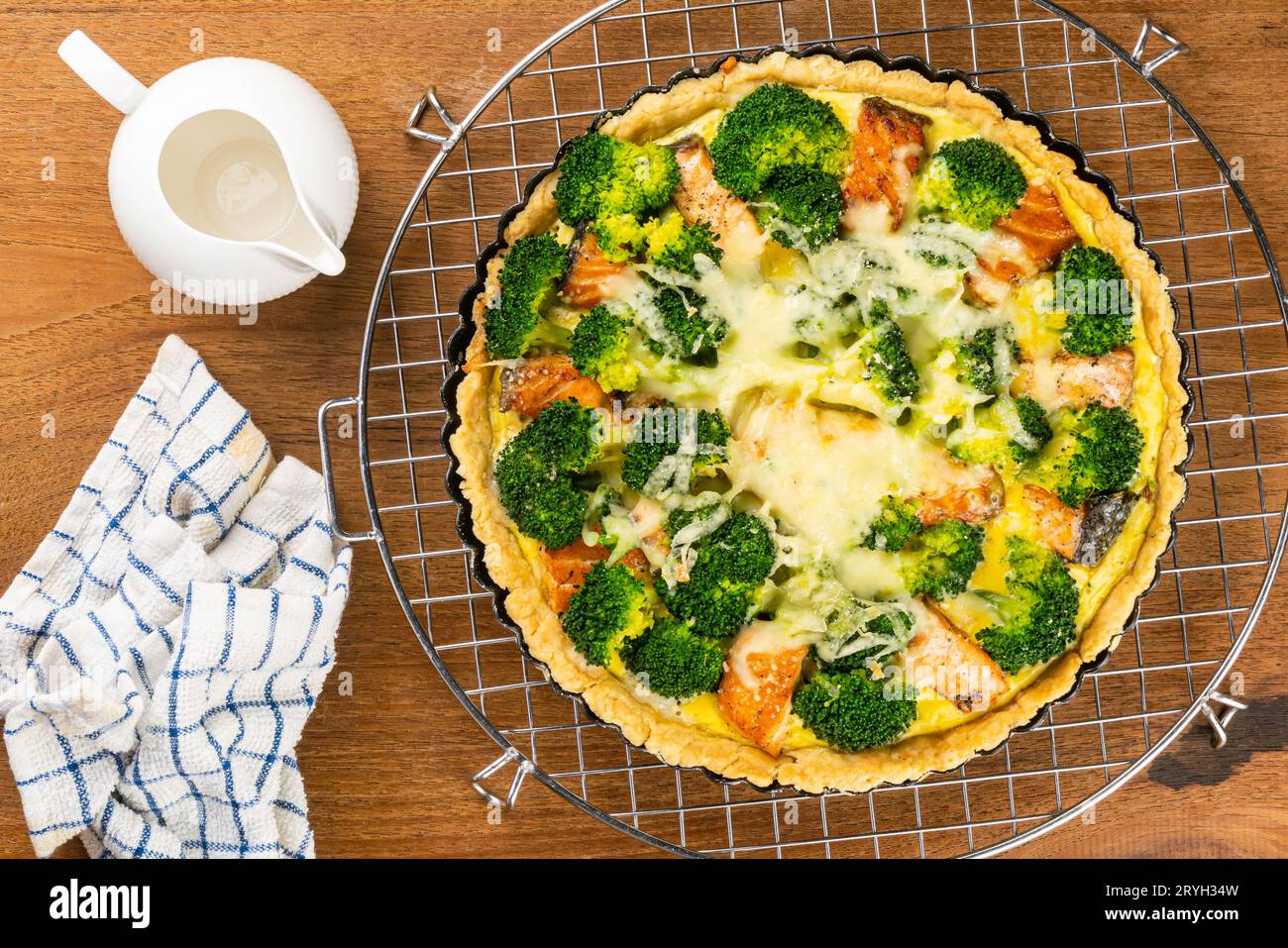 Top view quiche on cooling rack. Stock Photo