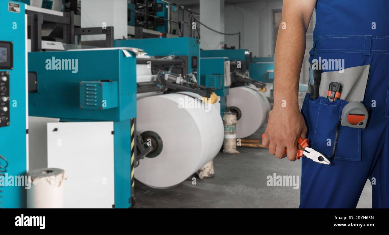 Man working in printing house Stock Photo