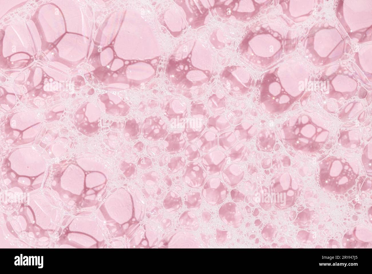 Skin care soap bubbles on pink background background texture. Full frame Stock Photo
