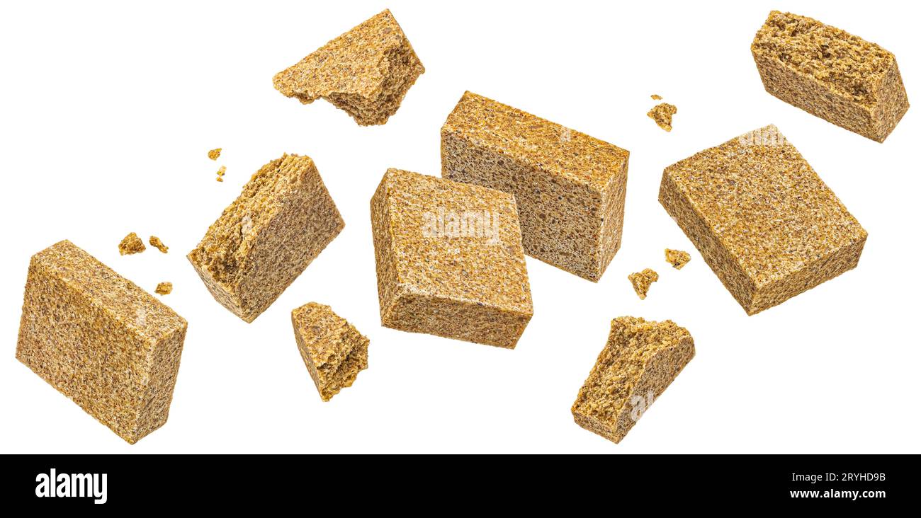 Falling bouillon cubes isolated on white background, beef broth