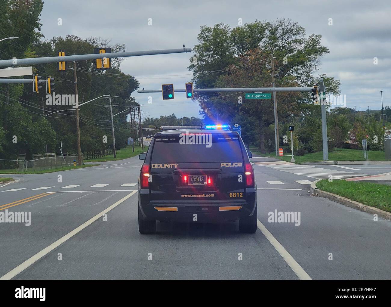 Wilmington, Delaware, U.S.A - September 30, 2023 - A state trooper SUV roaming the road with the siren on Stock Photo