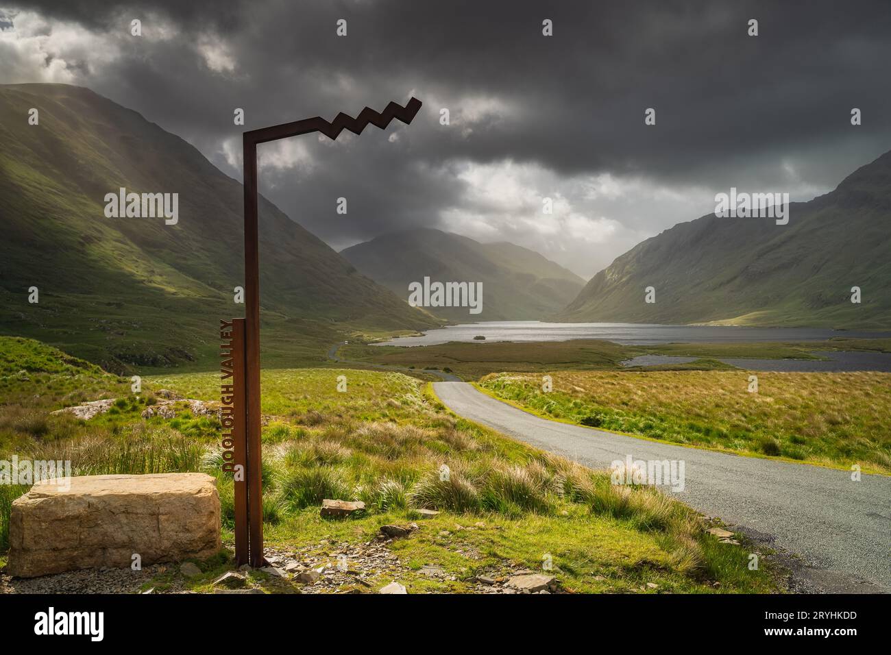 Doolough Valley sign with lakes mountain range in background, Ireland Stock Photo