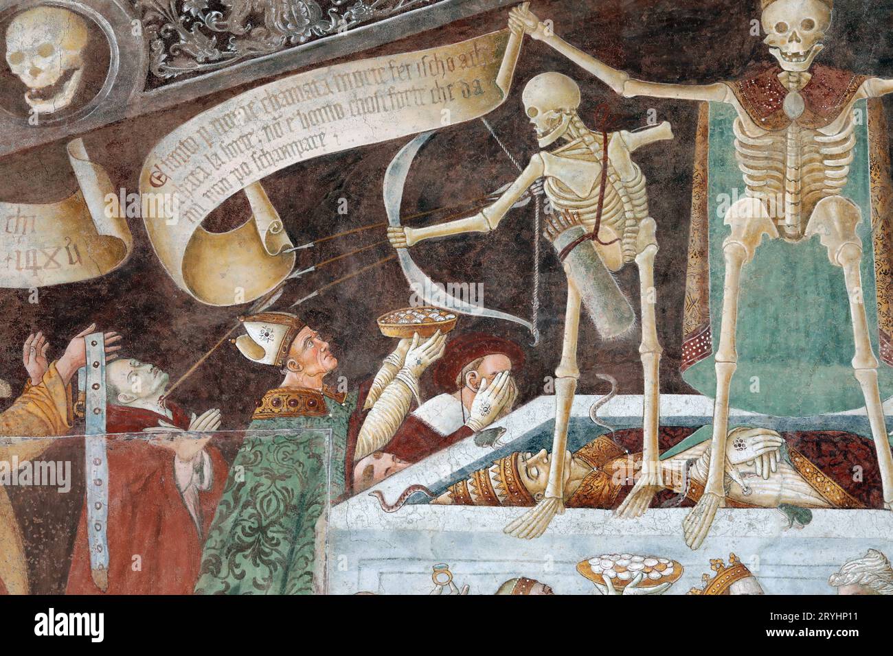 Death hits people in a medieval fresco of Clusone, Italy Stock Photo