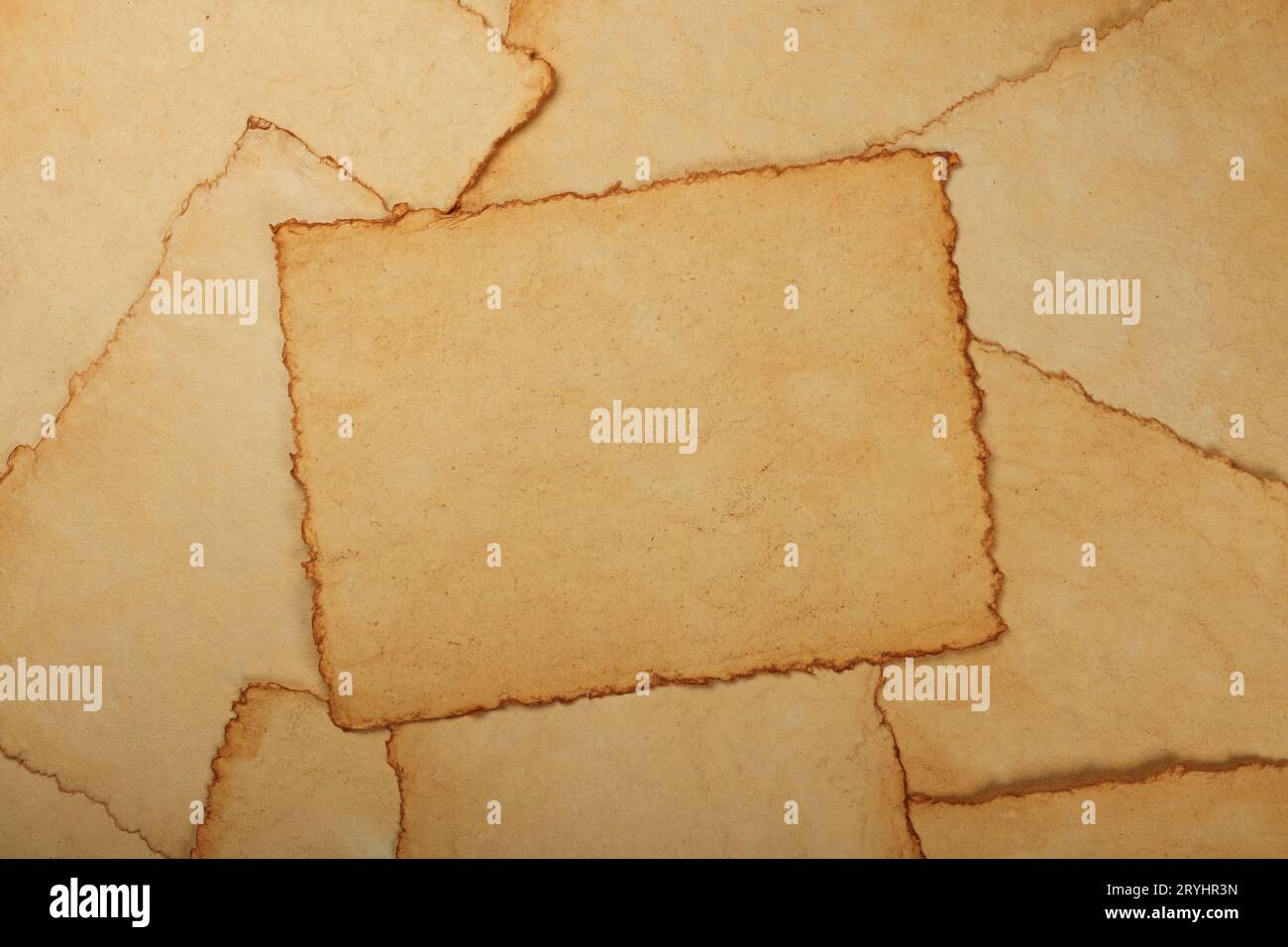 Old antique paper parchment sheets background Stock Photo