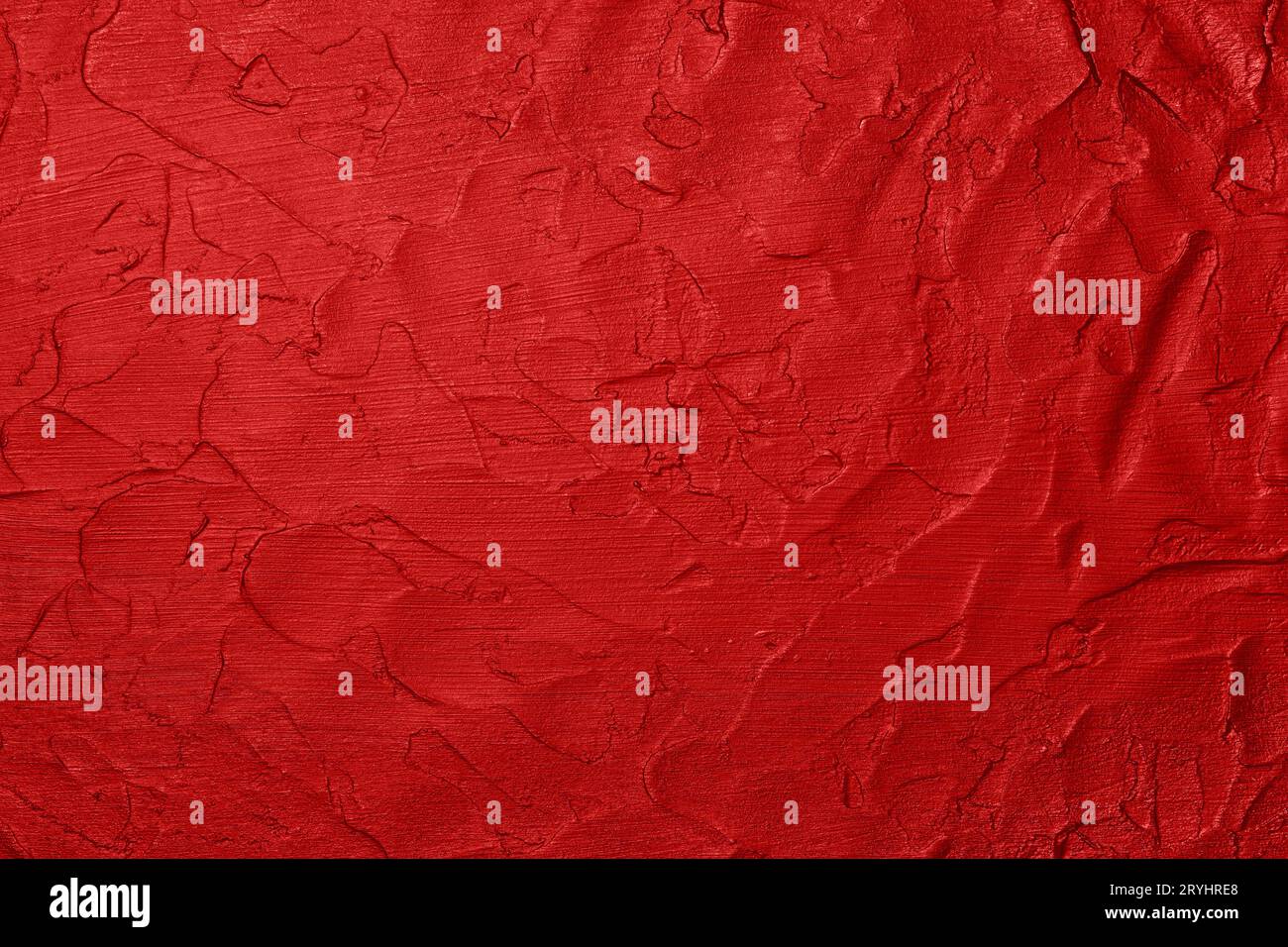 Red uneven grunge surface abstract background Stock Photo