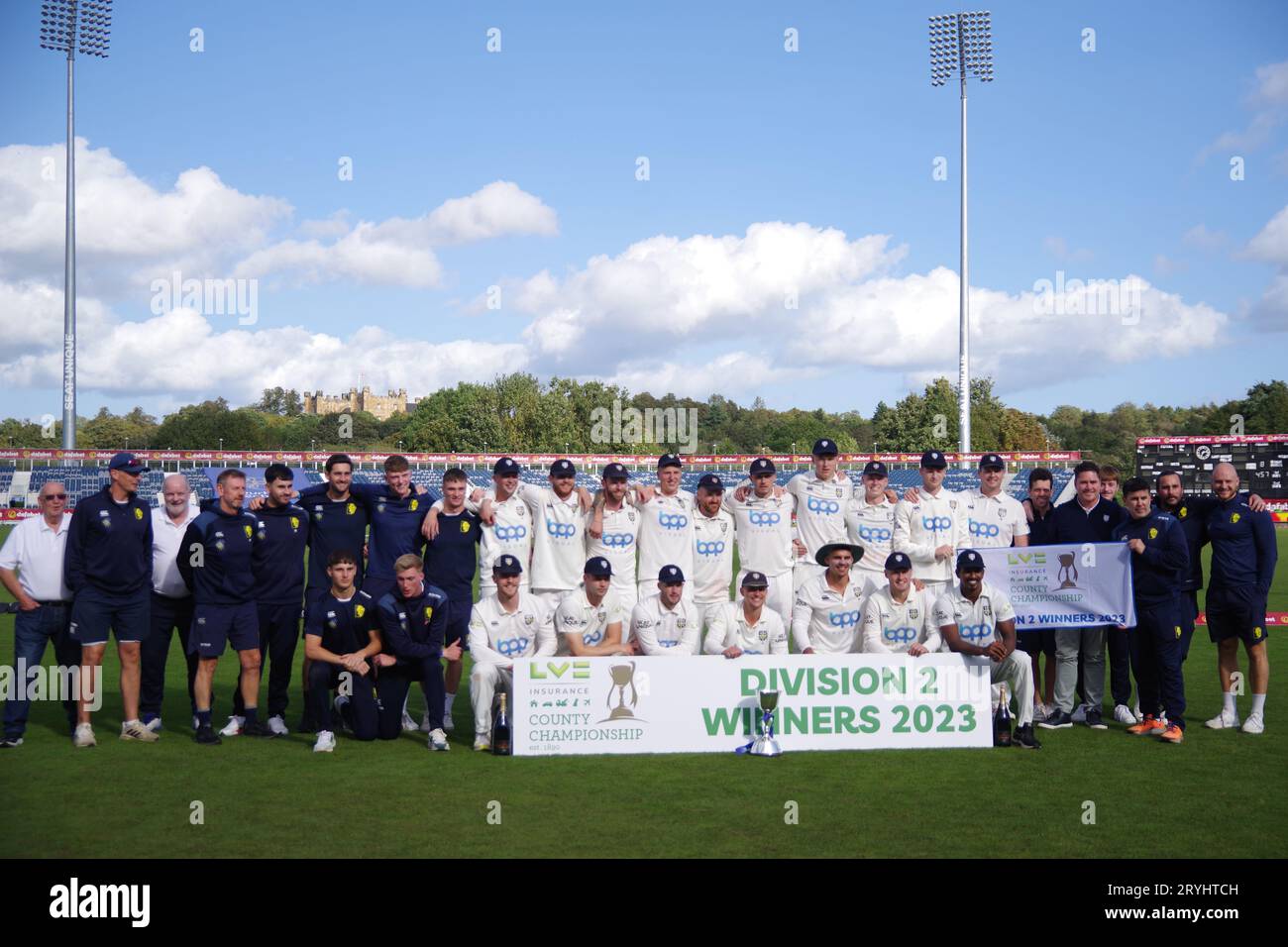 Chester le Street, 29 September 2023. The players and staff of Durham Cricket with the LV= County Championship Second Division Trophy. They were presented with it at the Seat Unique Riverside. Credit: Colin Edwards Stock Photo