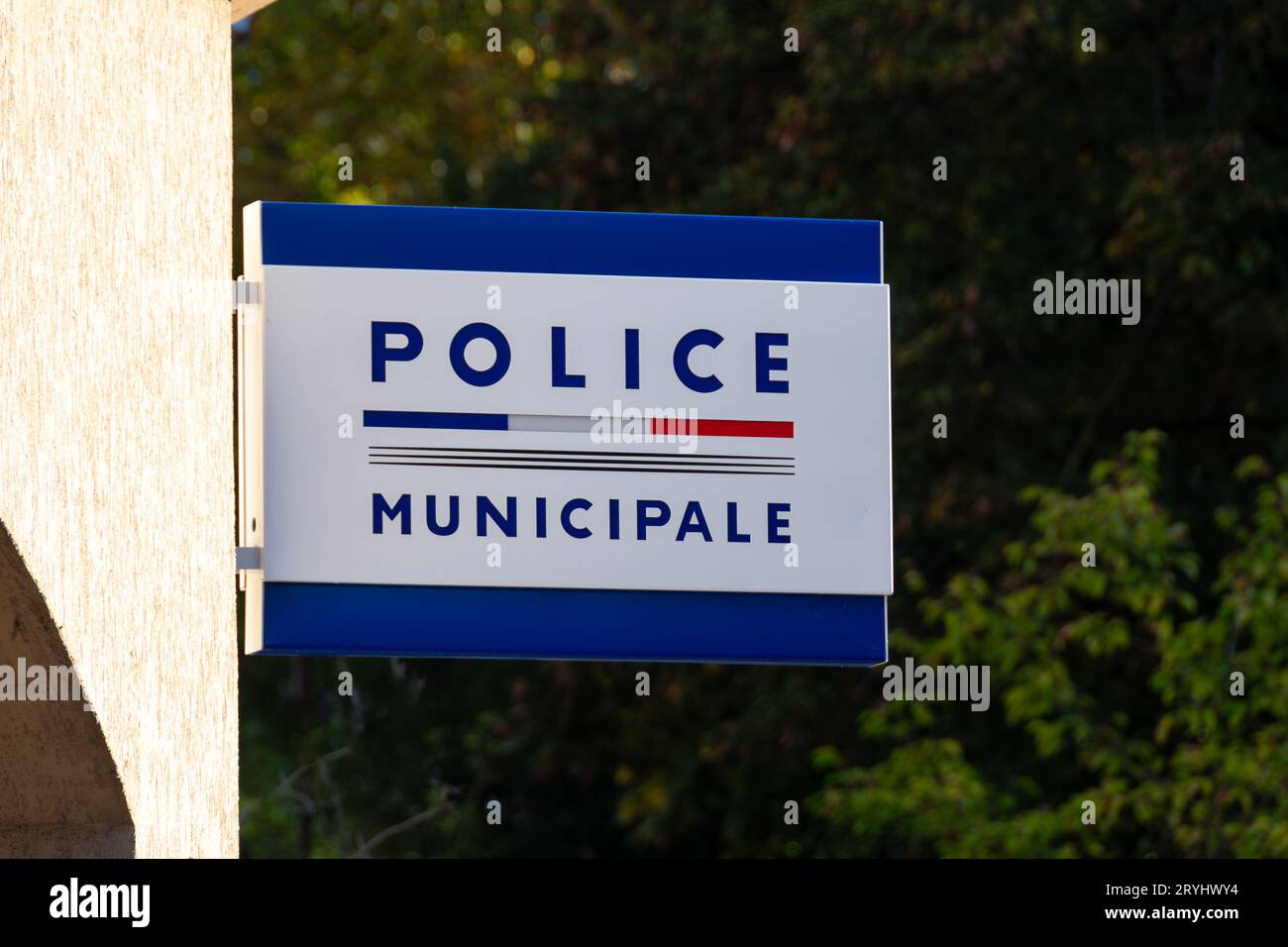 Close-up of a sign reading "Police Municipale" in French (i.e : local police), outside a municipal police station in France Stock Photo