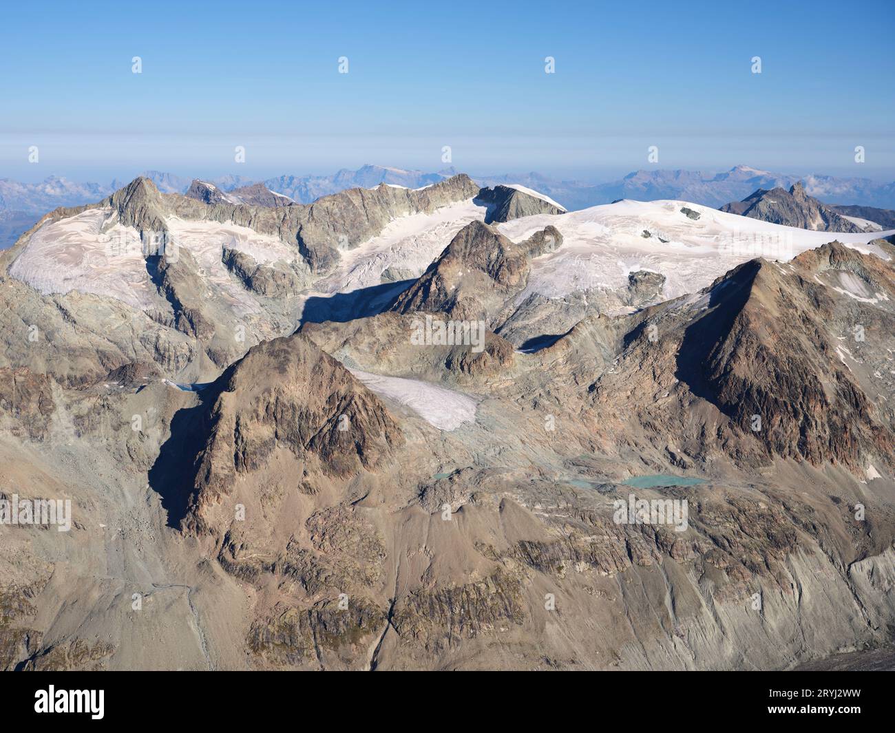 AERIAL VIEW. Mountain range between Val de Bagnes and Evolène, La Ruinette (3875m) on the left is the highest summit. Canton of Valais, Switzerland. Stock Photo