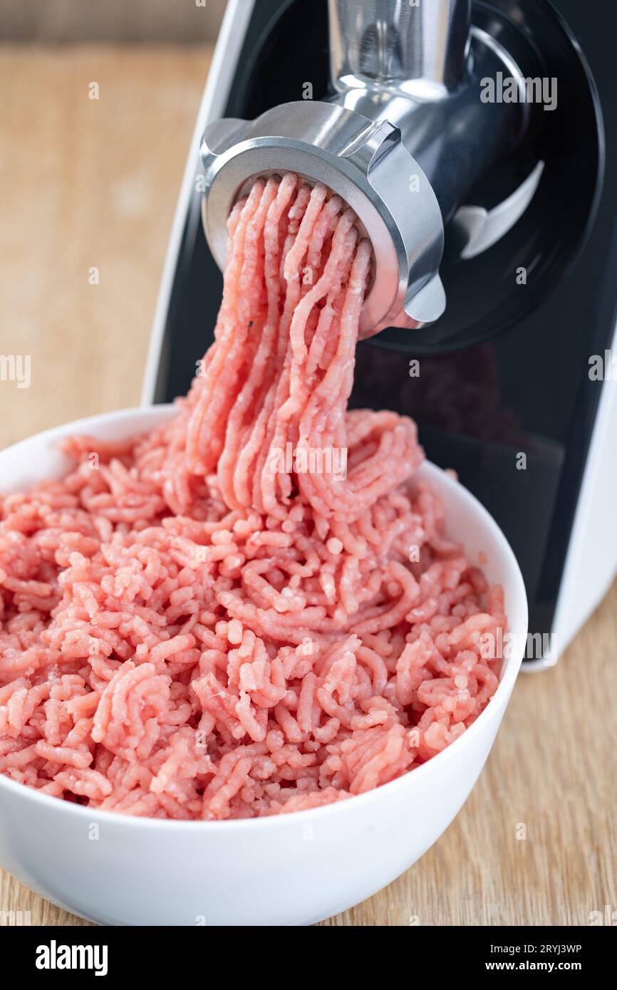 Electric meat grinder Stock Photo