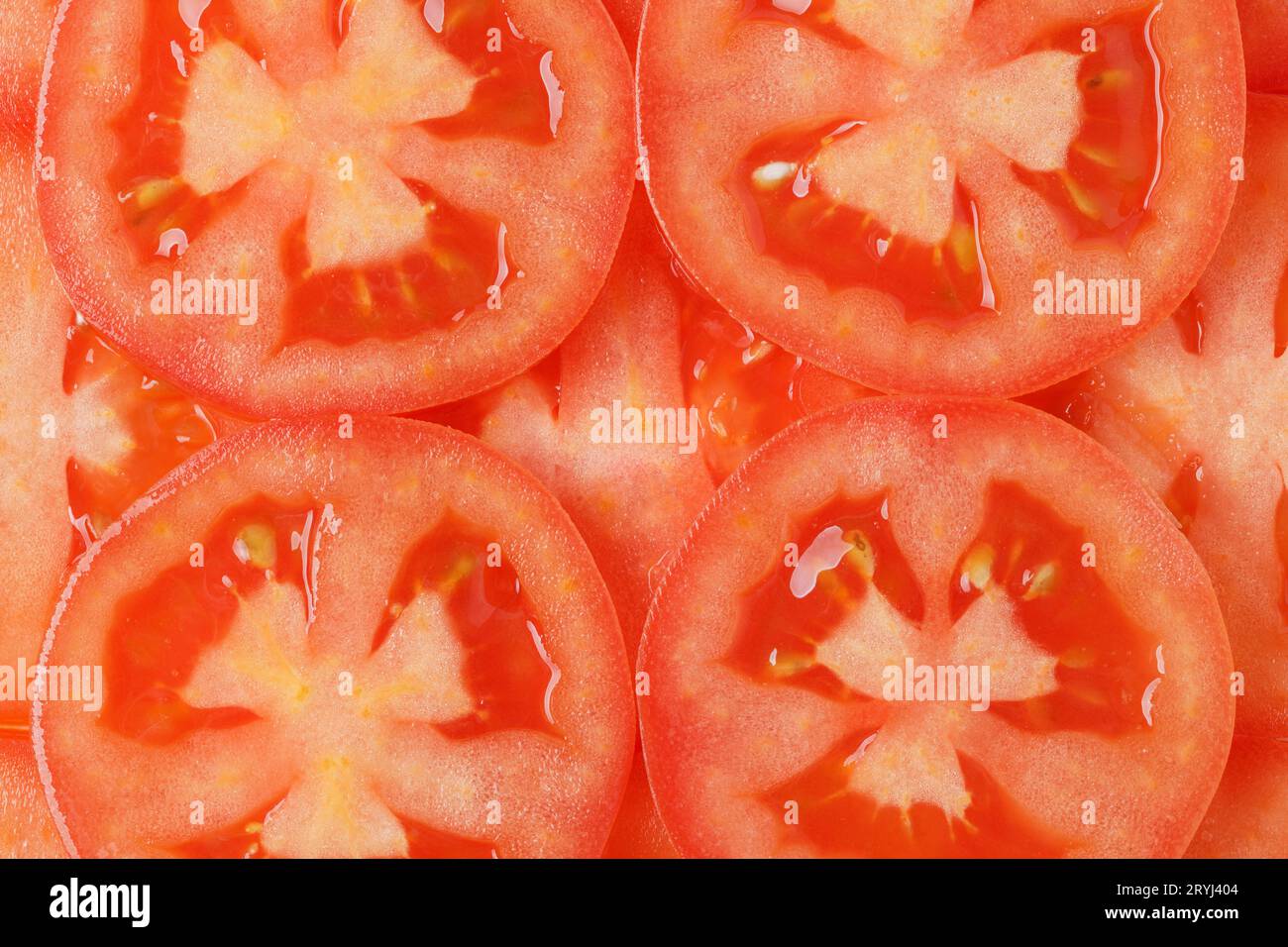 Tomato sliced background. Stock Photo
