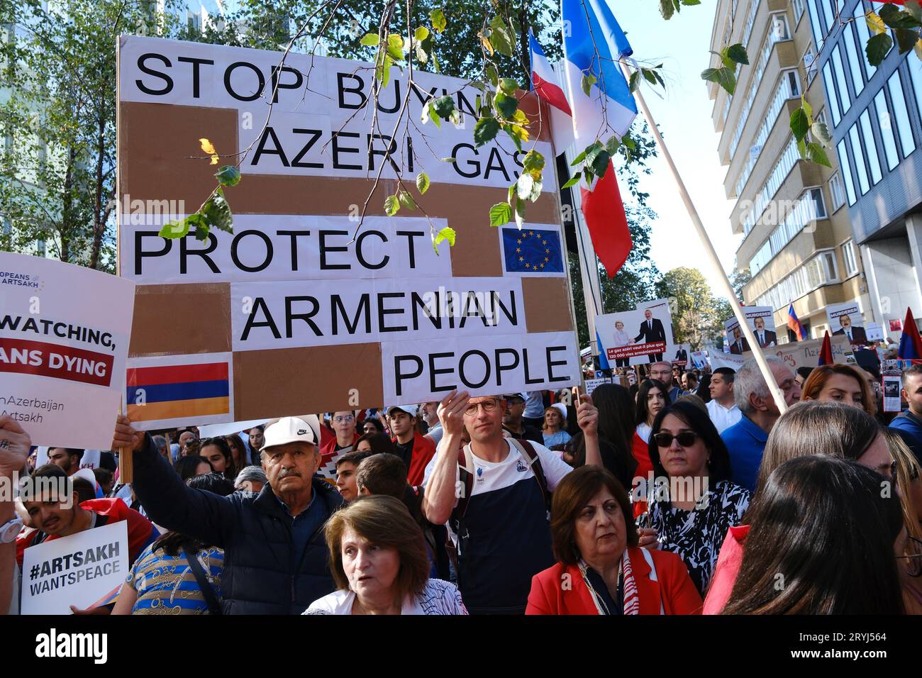 Brussels, Belgium. 01st Oct, 2023. Protestors carry placards and wave