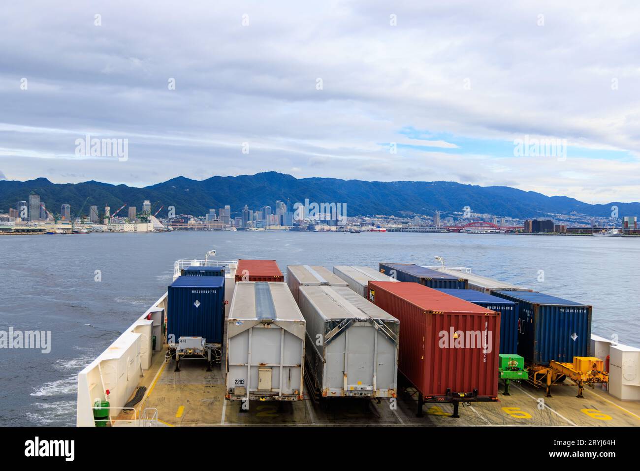 Kobe, Japan - September 23, 2023: Shipping containers loaded on ferry ...
