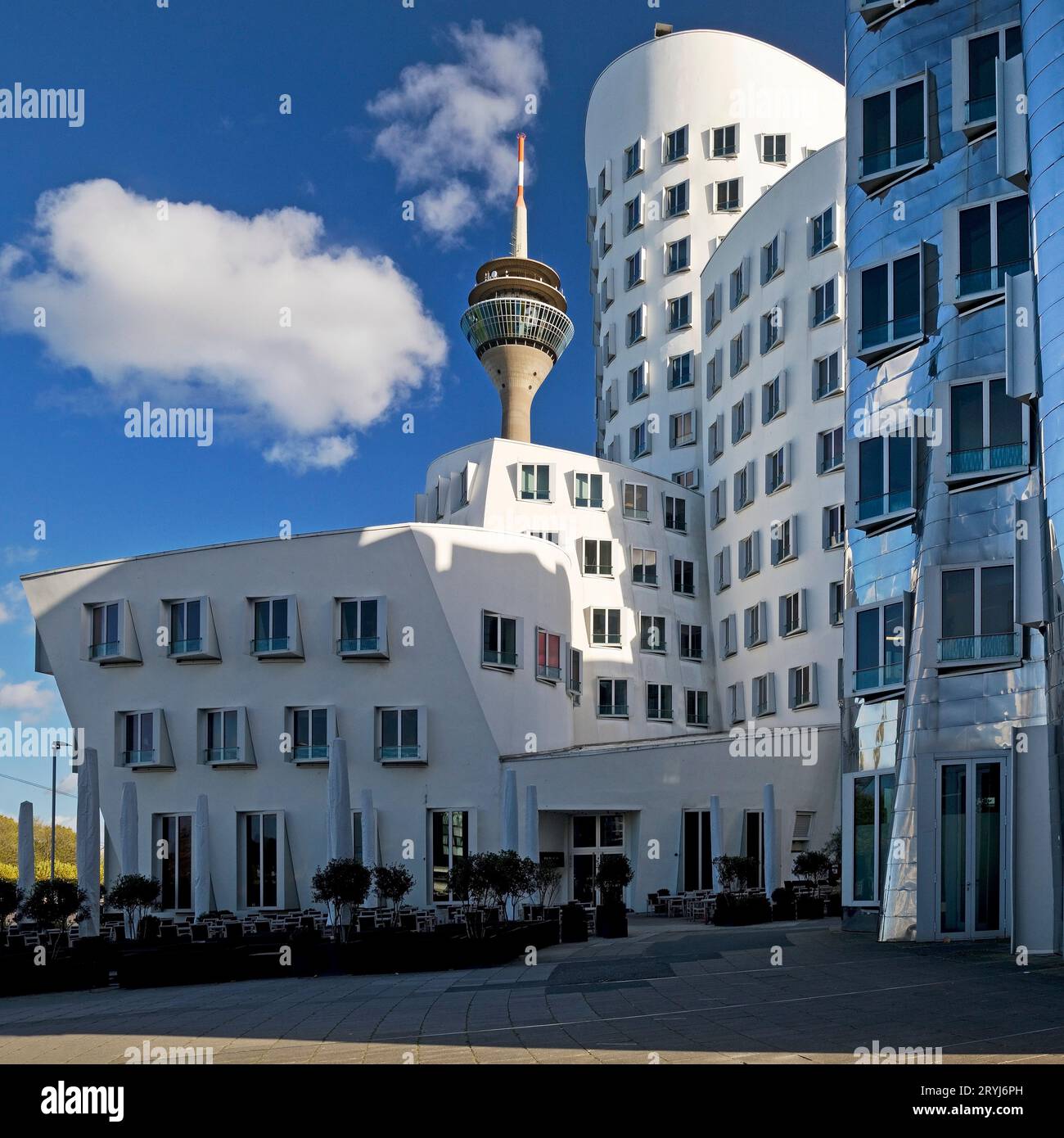 The Neue Zollhof with two Gehry buildings and the Rheinturm, Duesseldorf, Germany, Europe Stock Photo