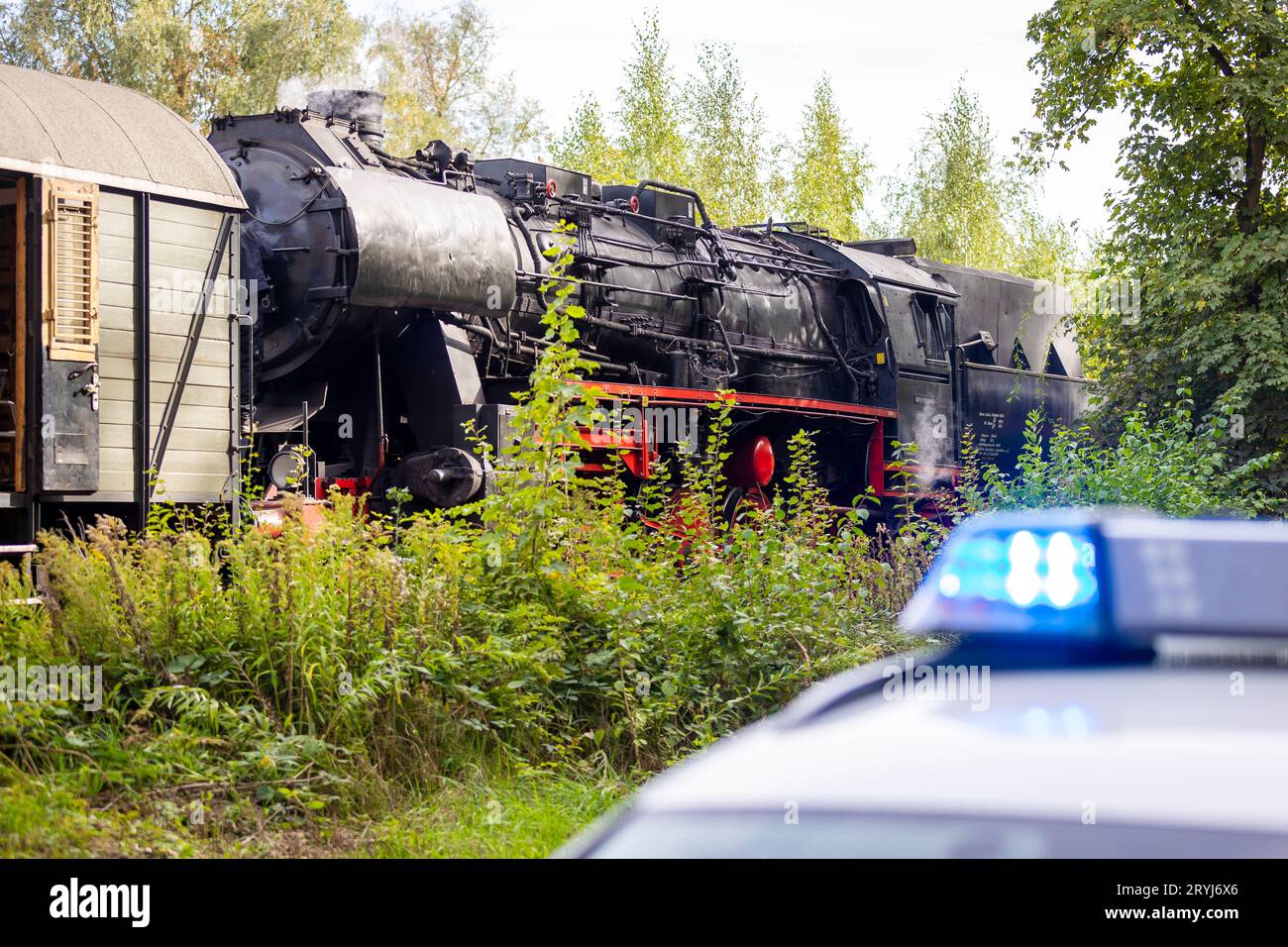 Stadthagen, Germany. 01st Oct, 2023. A museum train stands behind a police emergency vehicle after an accident with a tractor in the Schaumburg district. A tractor with trailer and the museum train had collided here. Credit: Moritz Frankenberg/dpa/Alamy Live News Stock Photo
